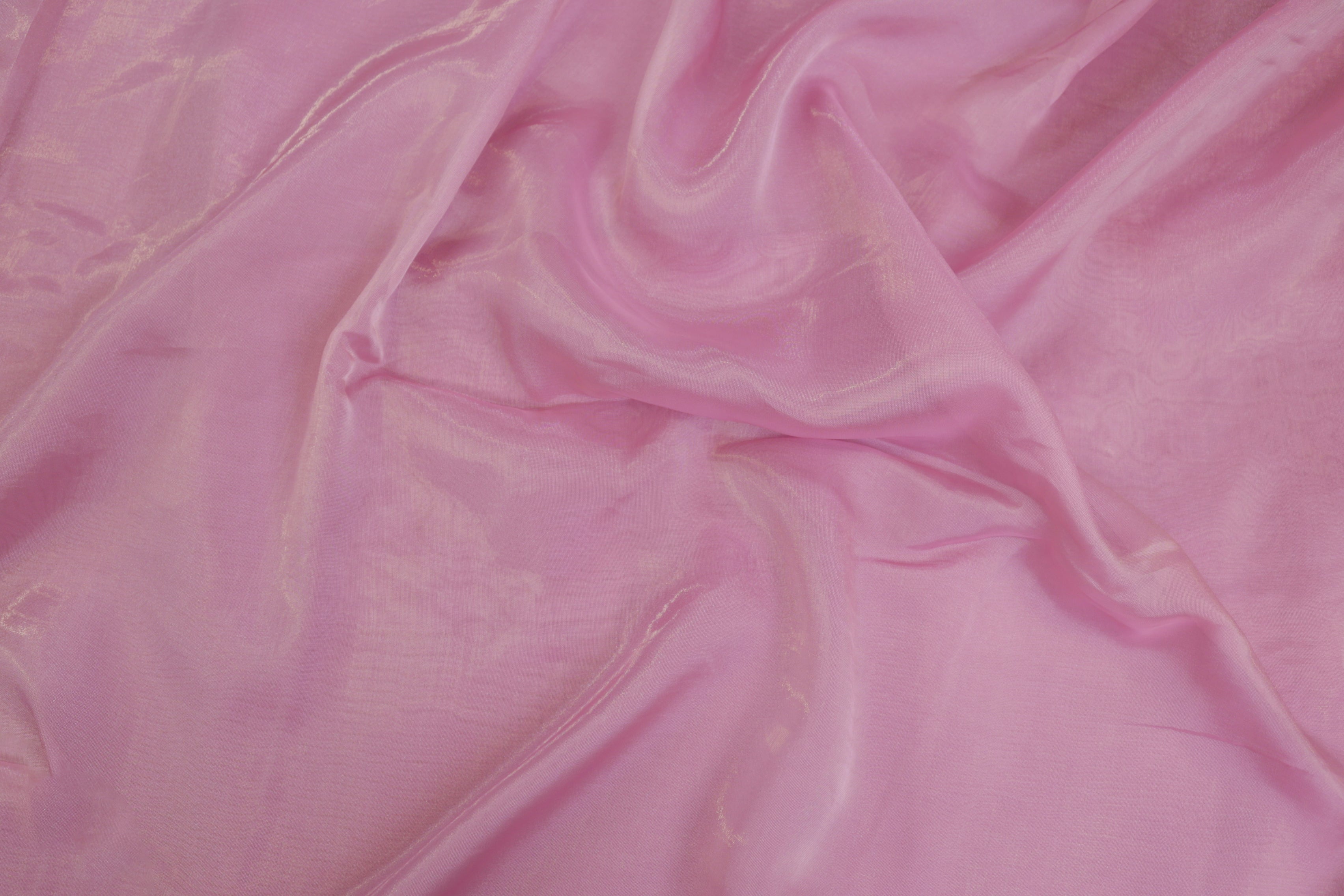 Purple pink coloured Soft tissue tissue fabric with silver shimmer