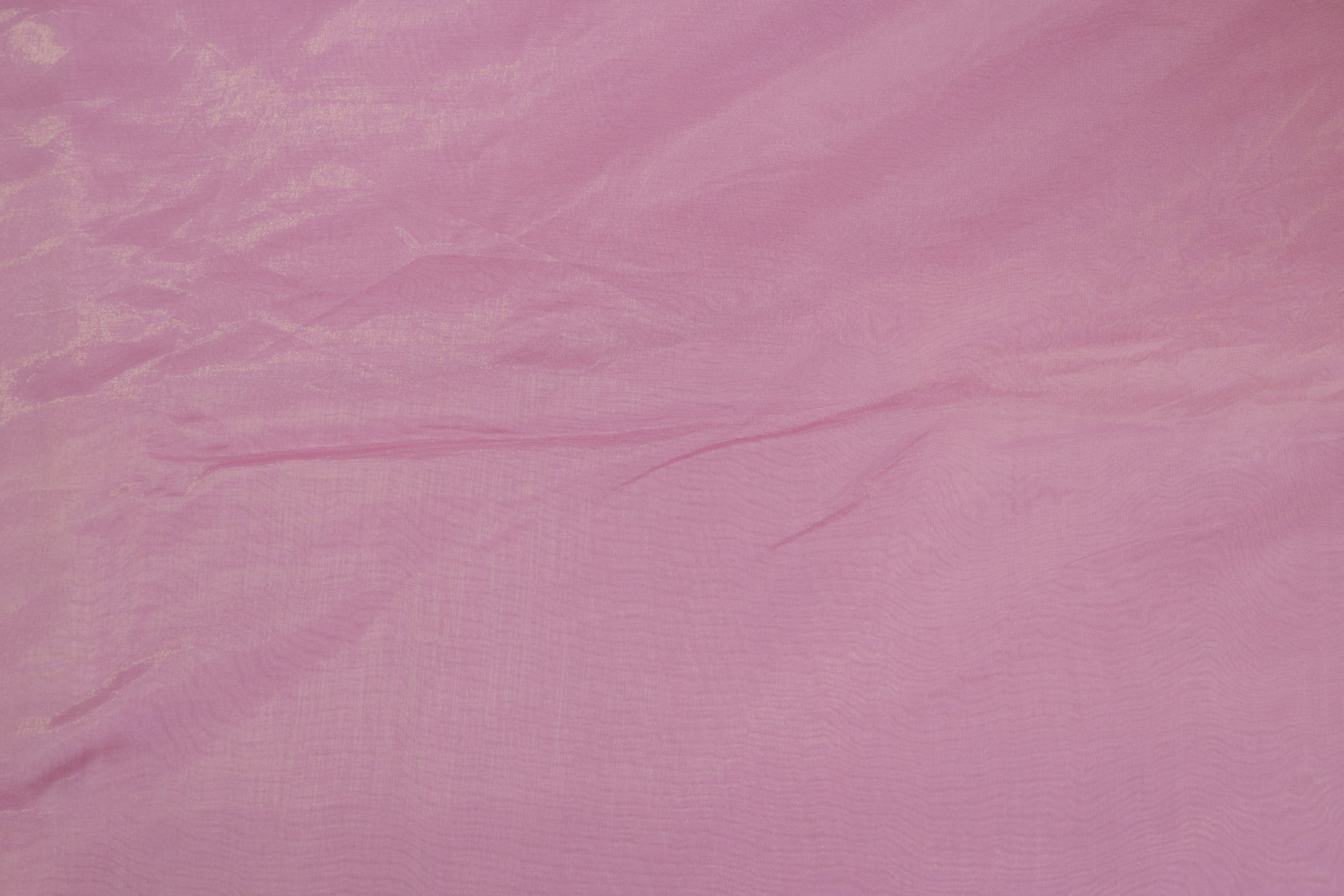 Purple pink coloured Soft tissue tissue fabric with silver shimmer