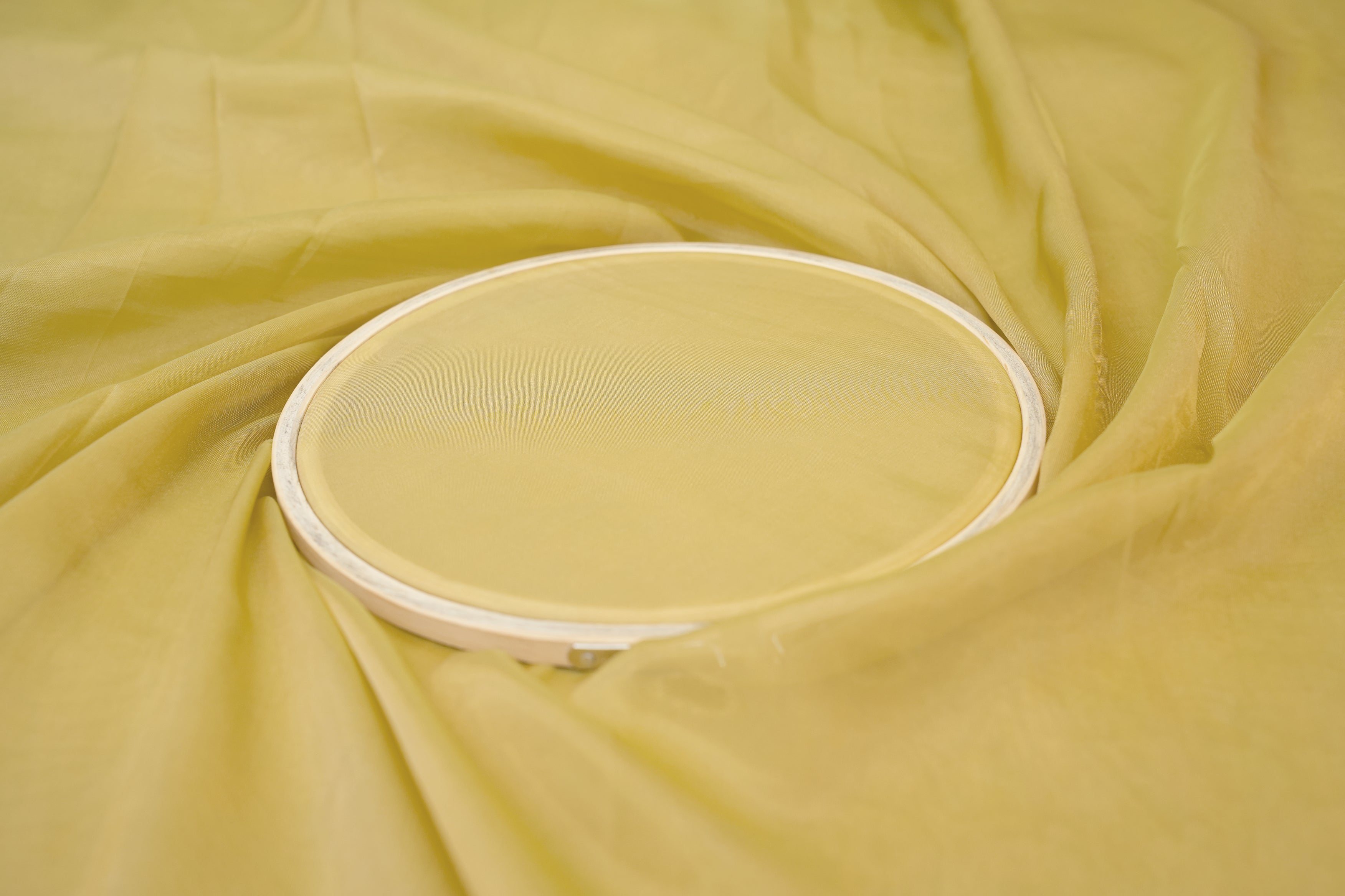 Gold  coloured Soft tissue tissue fabric with shimmer