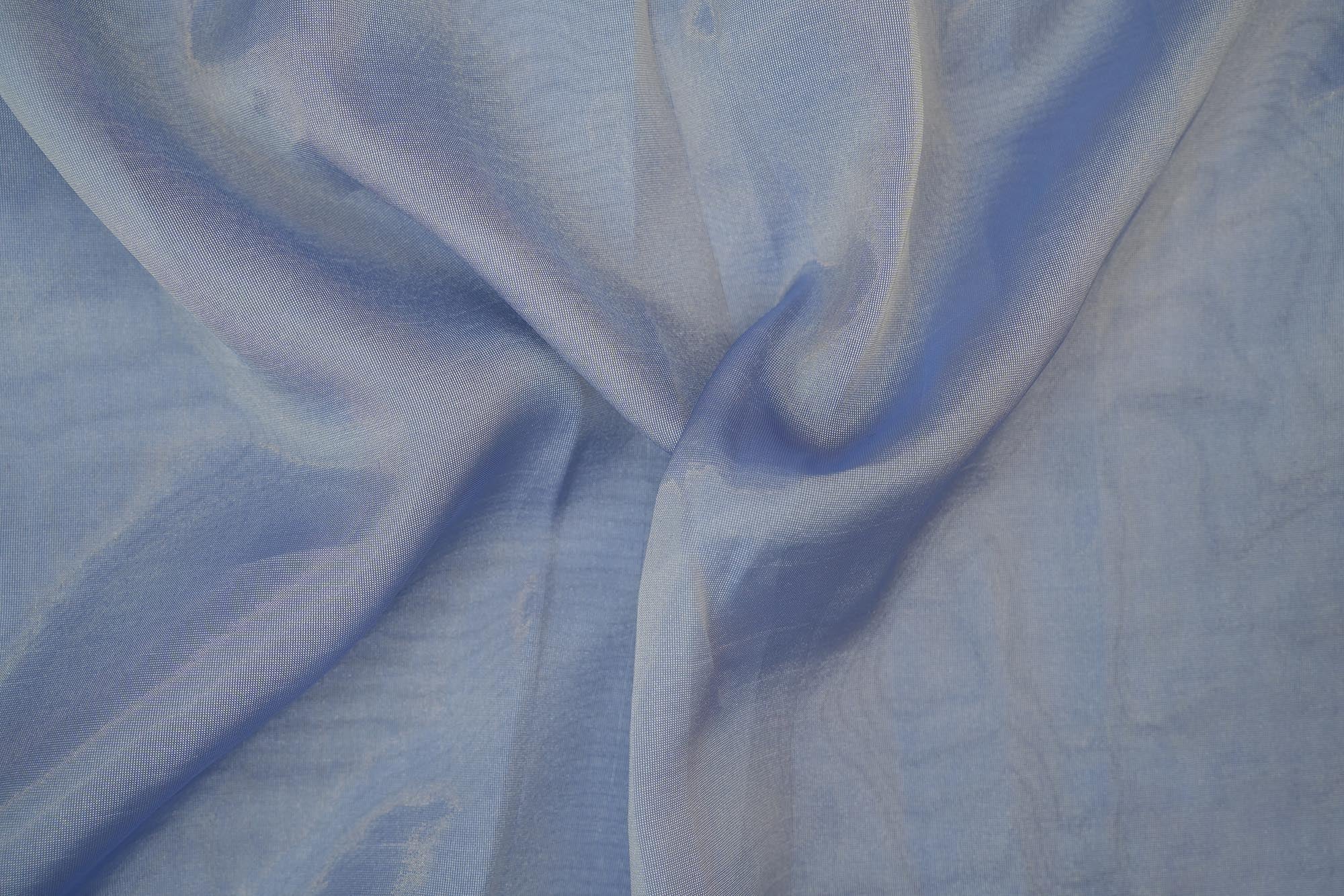 Sky blue coloured soft  tissue fabric with shimmer