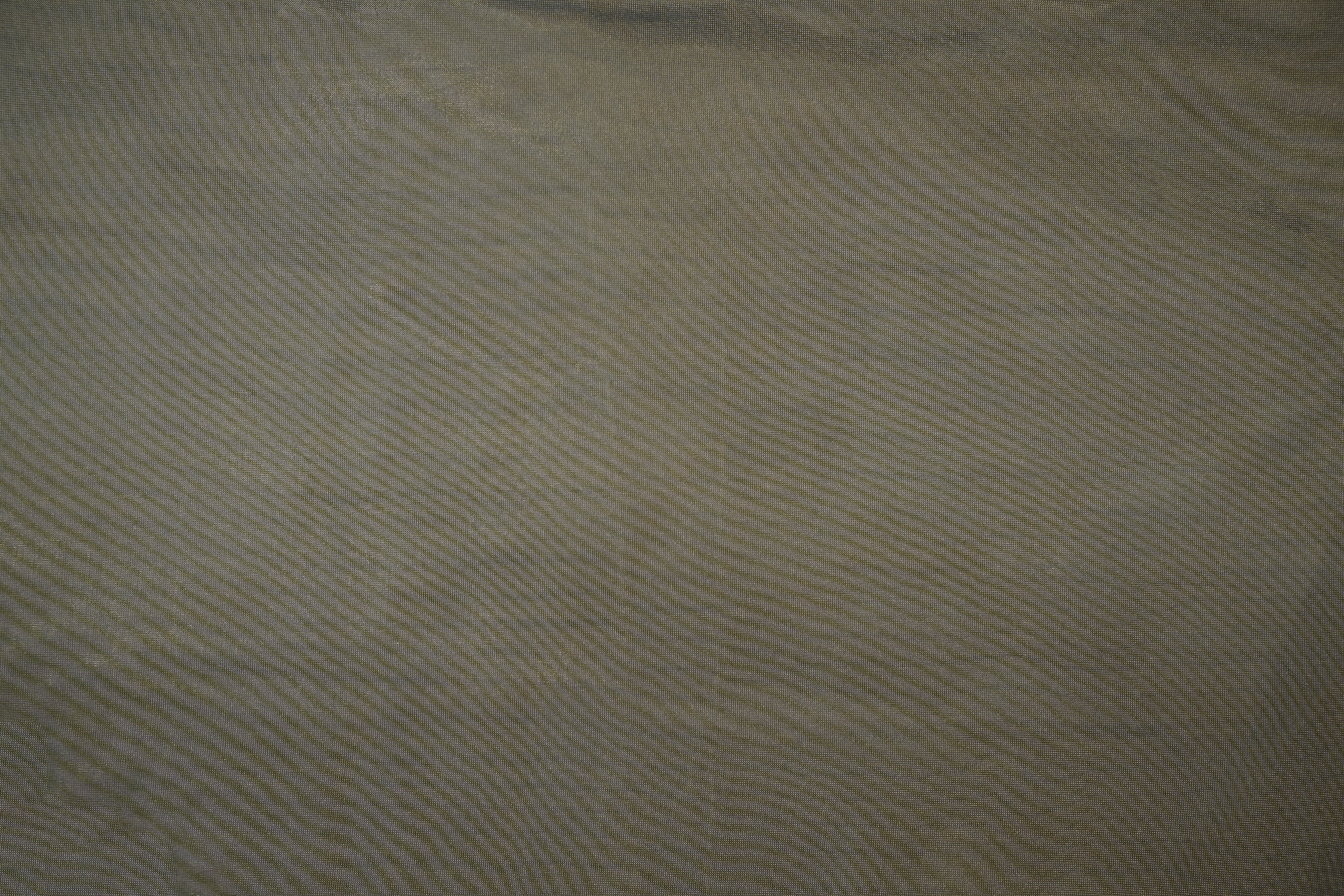 Grey gold coloured Soft tissue tissue fabric with shimmer