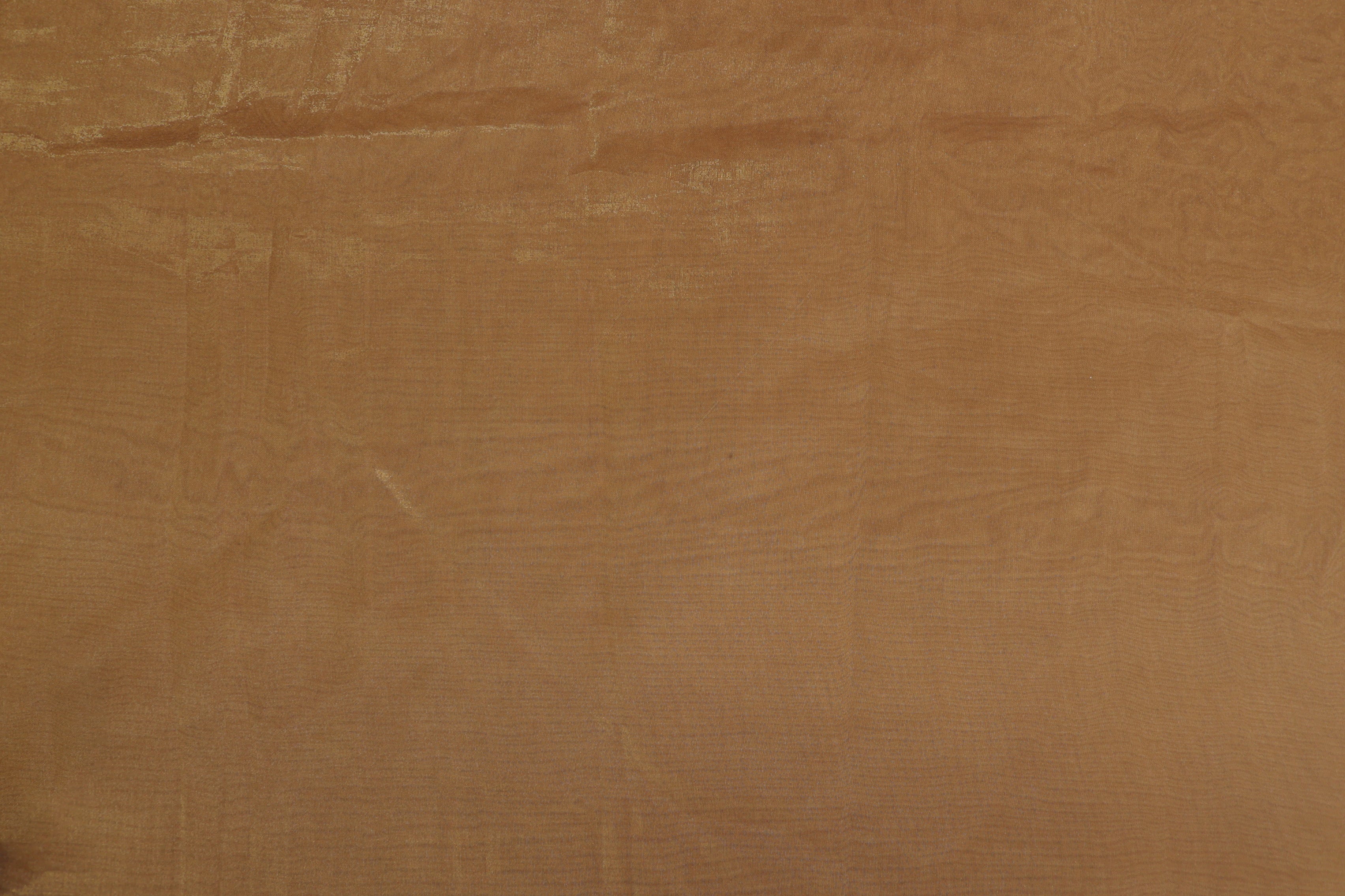 Light brown coloured Soft tissue tissue fabric with gold shimmer