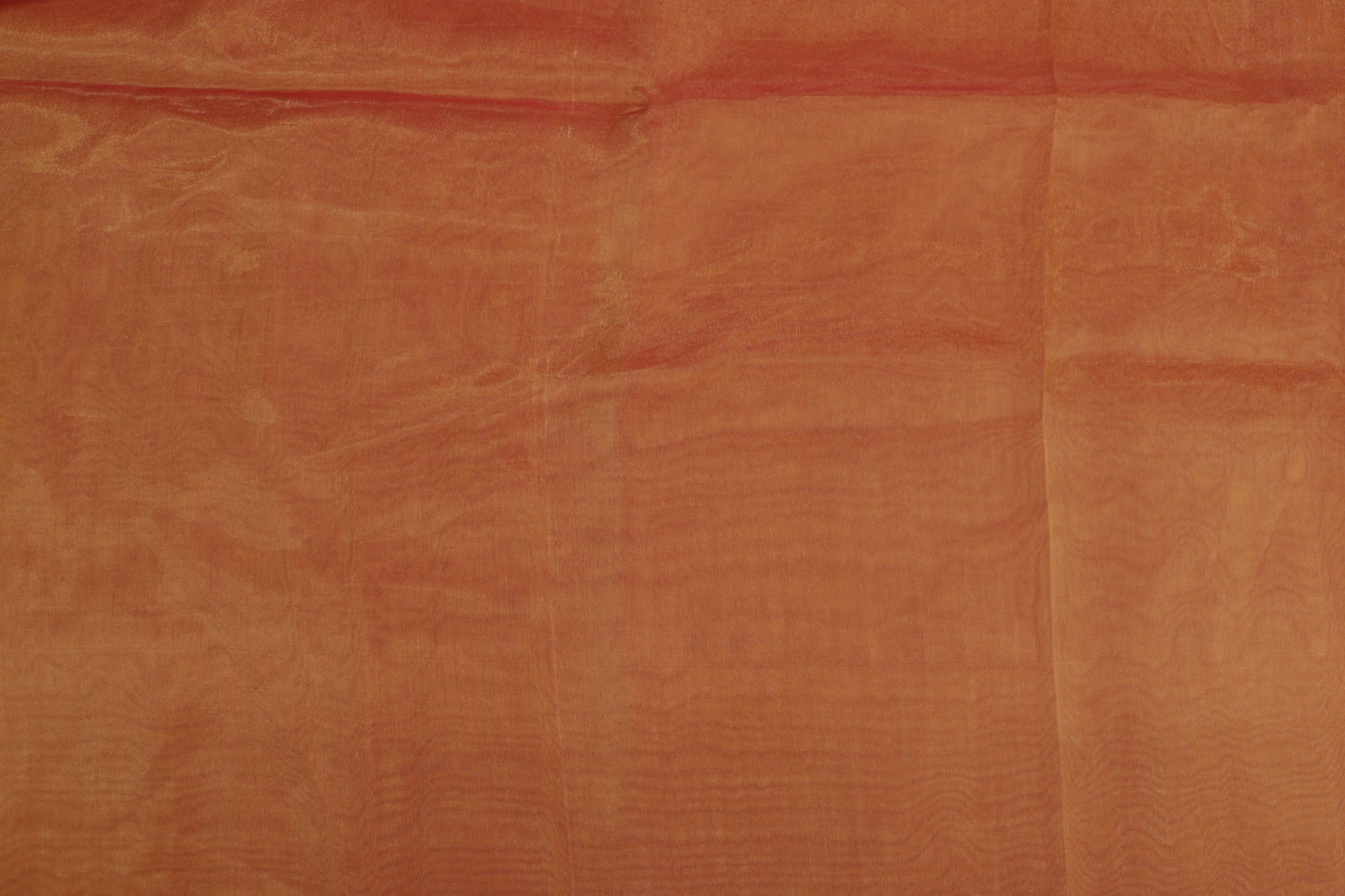 Rust orange coloured Soft tissue tissue fabric with gold shimmer