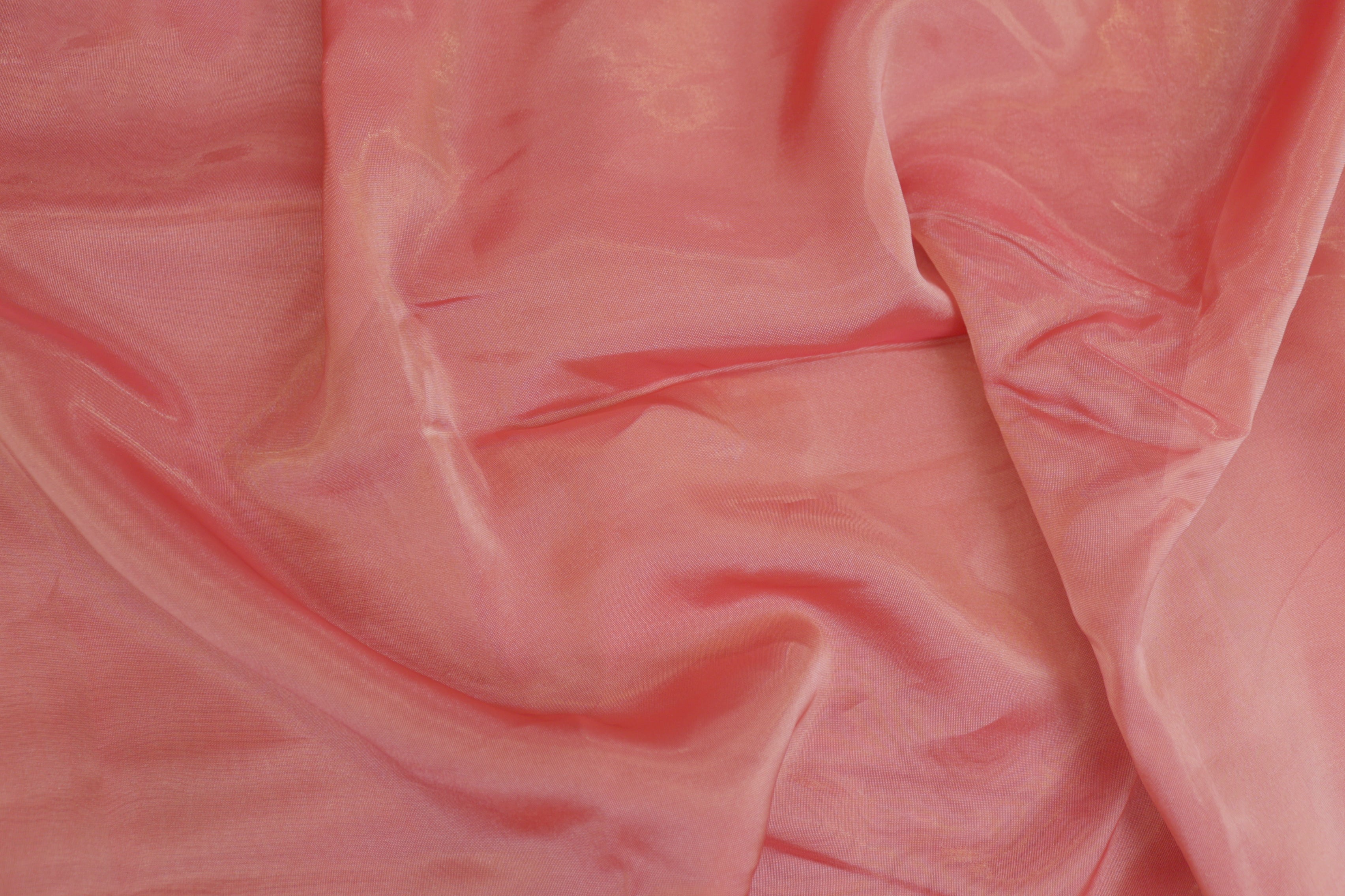 Gajri pink coloured Soft tissue tissue fabric with gold shimmer