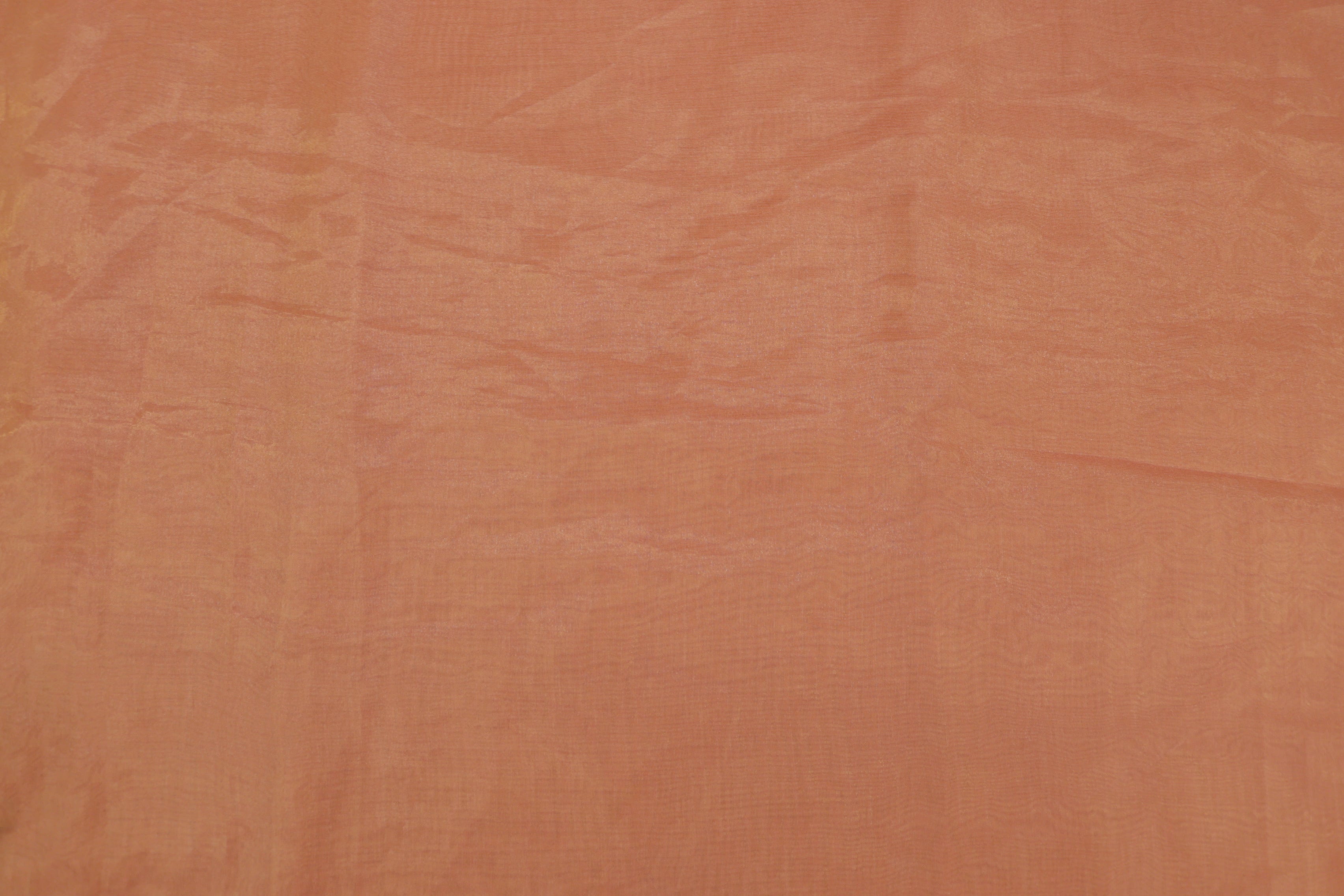 Peach pink coloured Soft tissue tissue fabric with gold shimmer