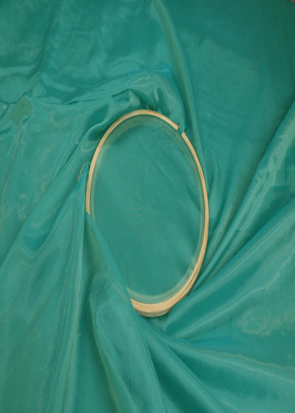 Firozi Coloured Soft Tissue Fabric With Gold Shimmer 9274(9)