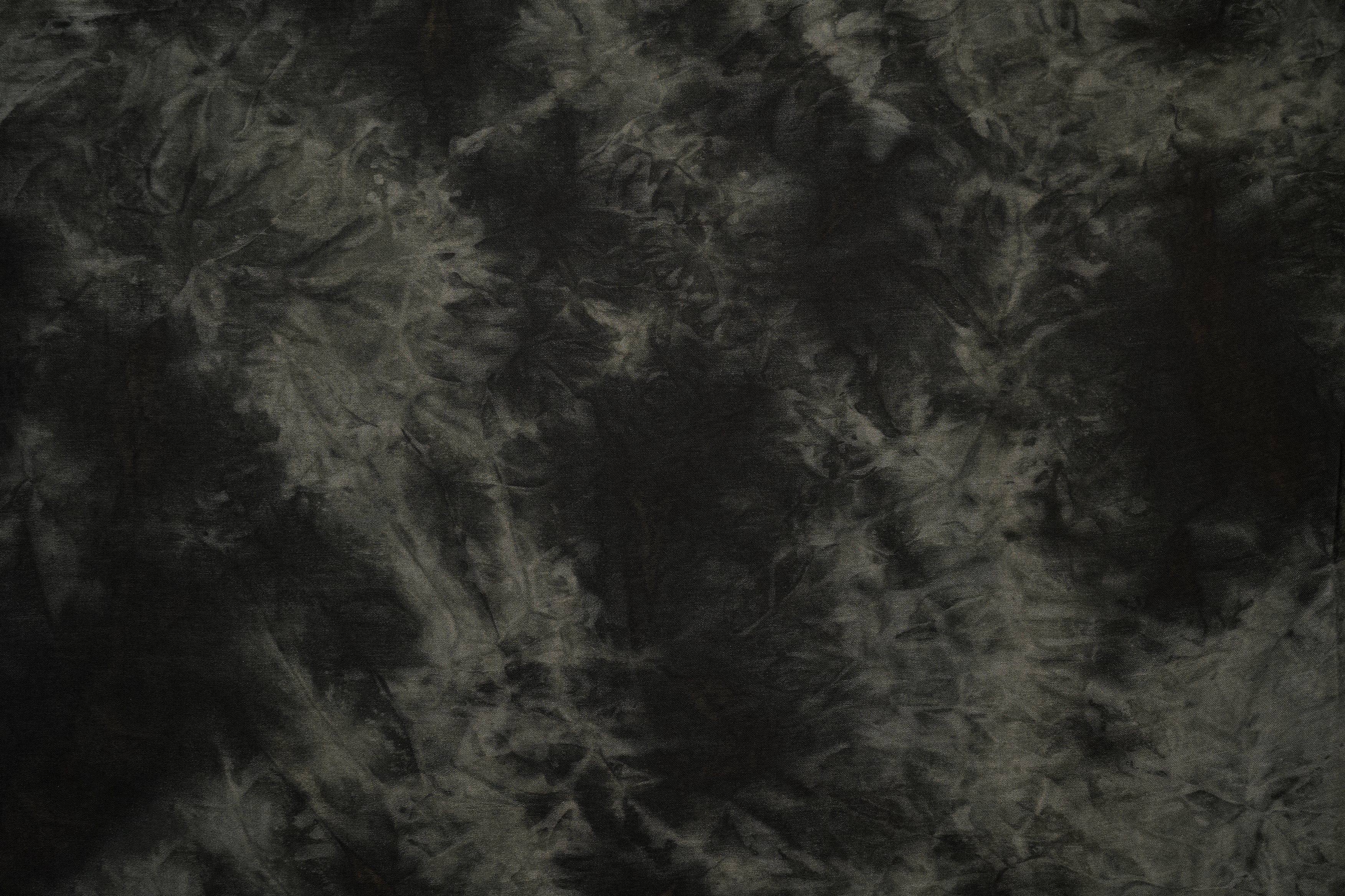 Black coloured soft sued texture