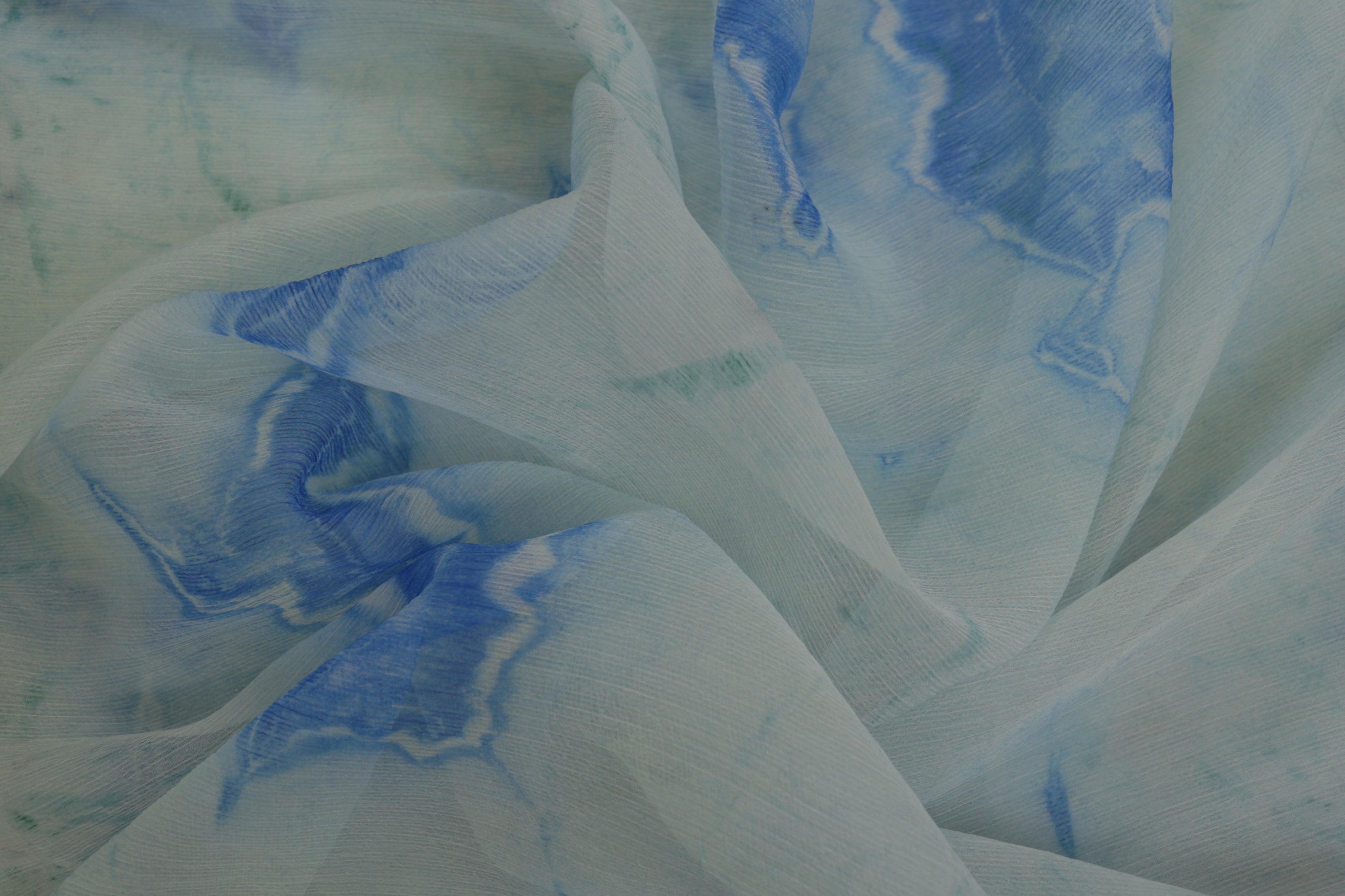 Blue coloured textured chiffon fabric