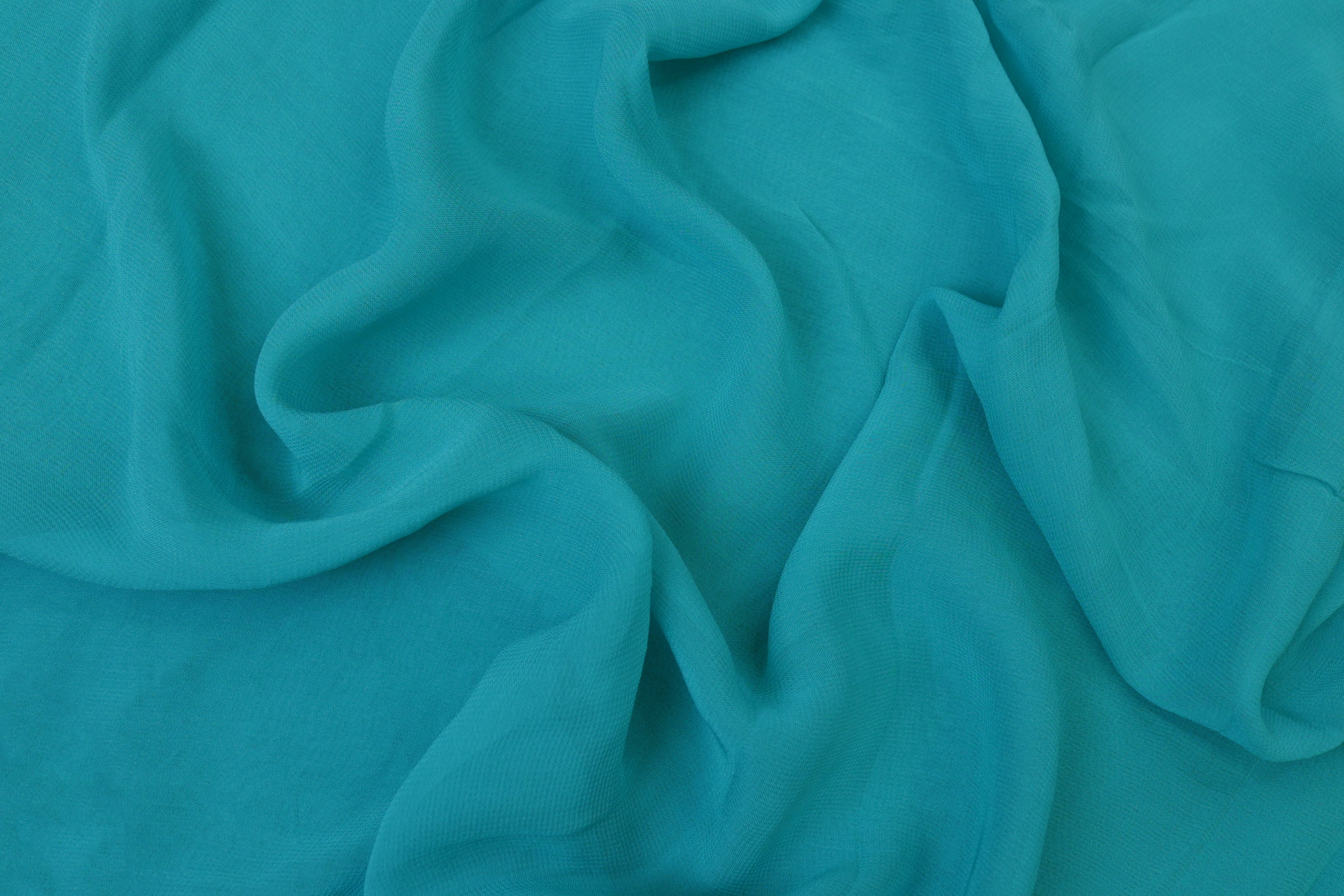 Light rama green plain georgette fabric