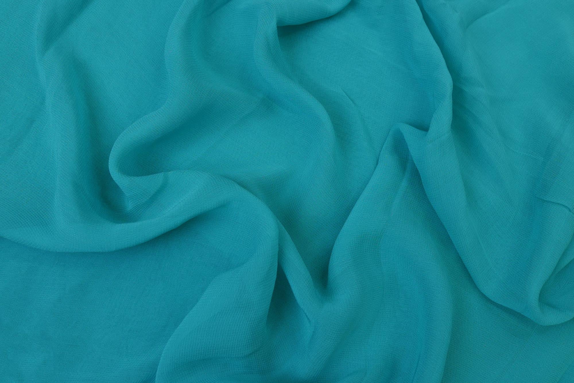 Light rama green plain georgette fabric