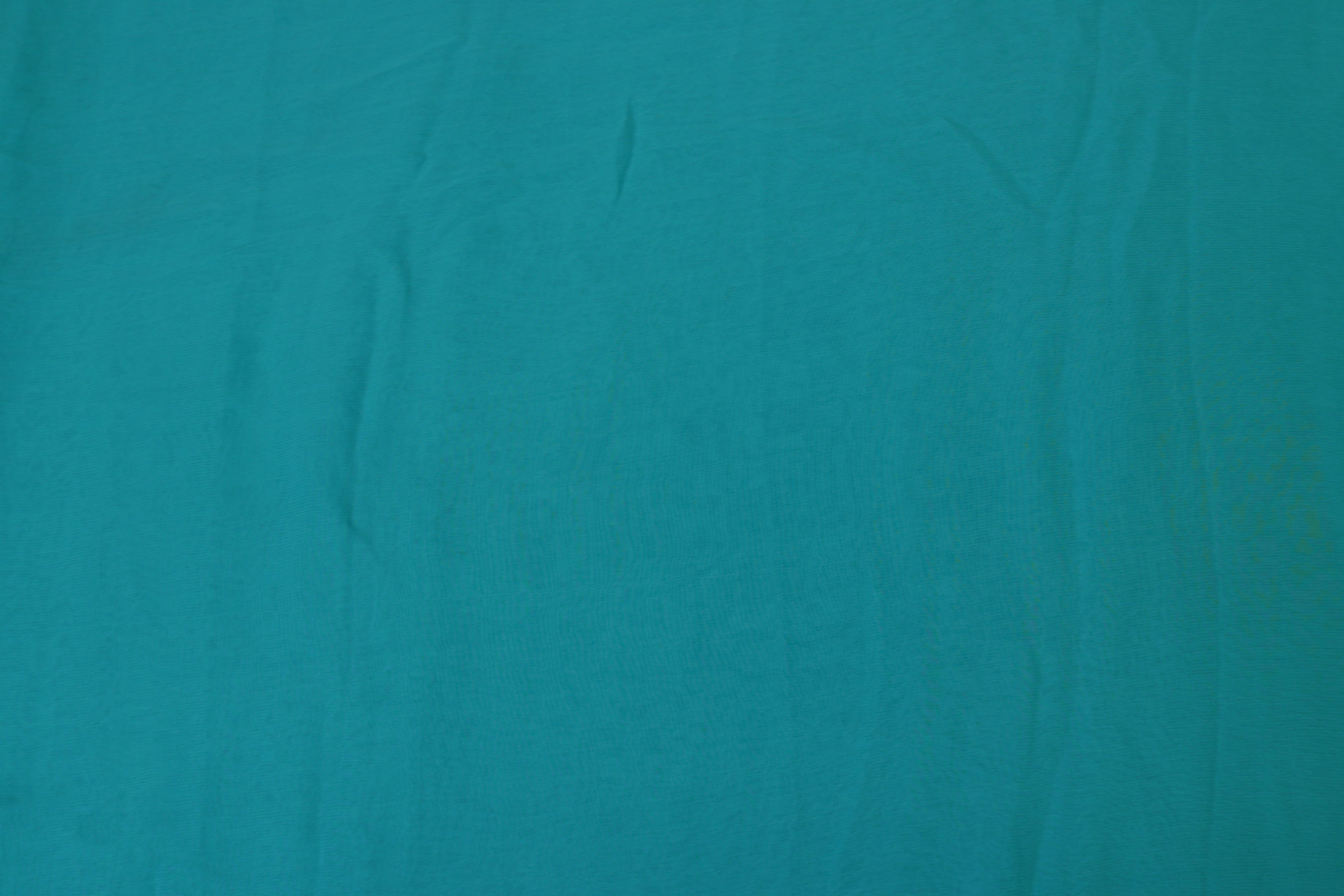 Light rama green plain georgette fabric