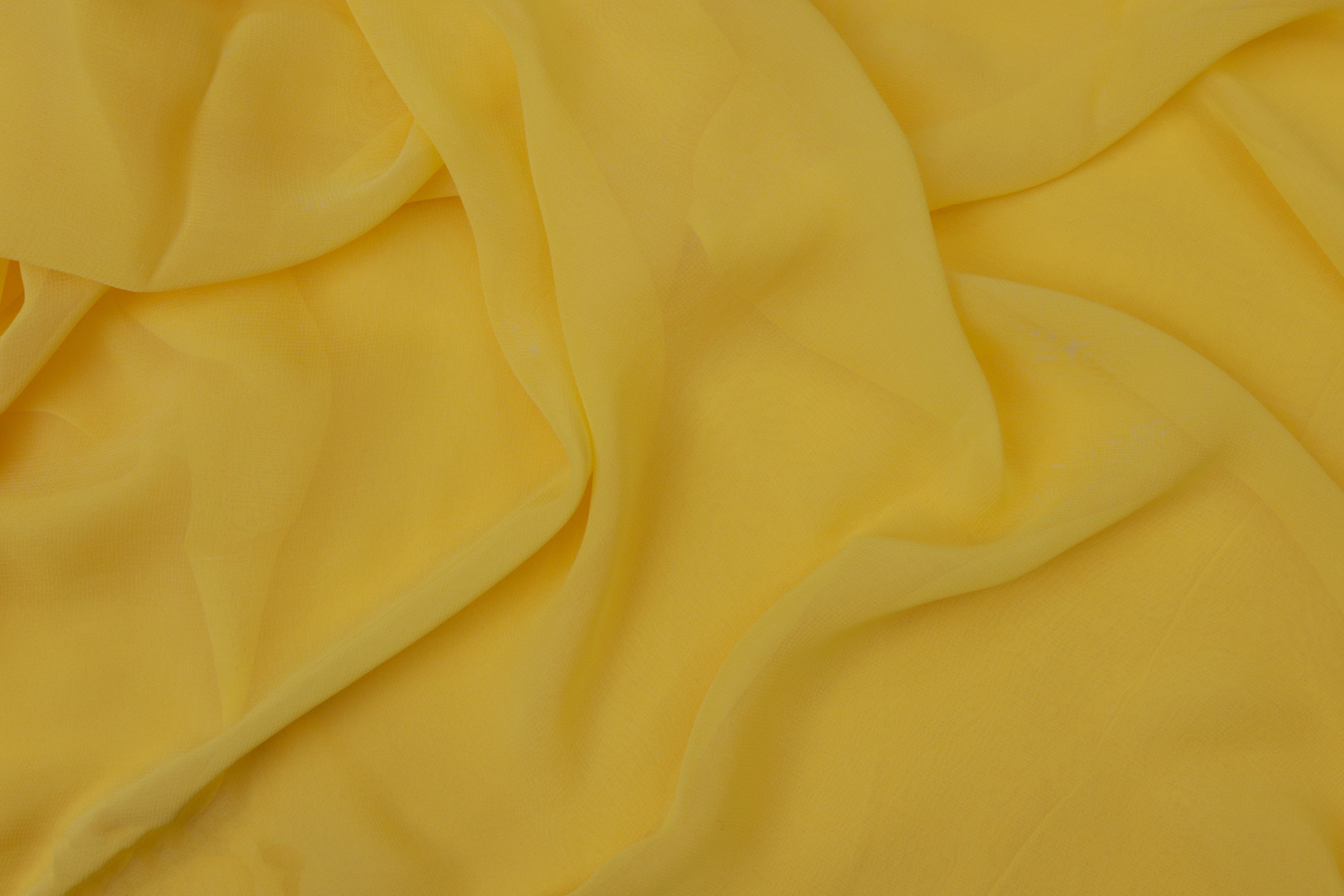 Bright golden plain georgette fabric