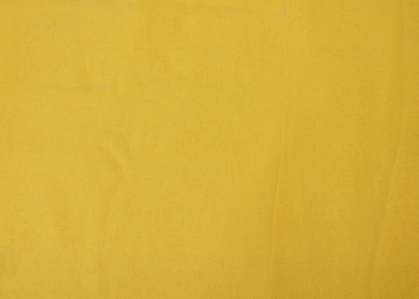 Bright golden plain georgette fabric