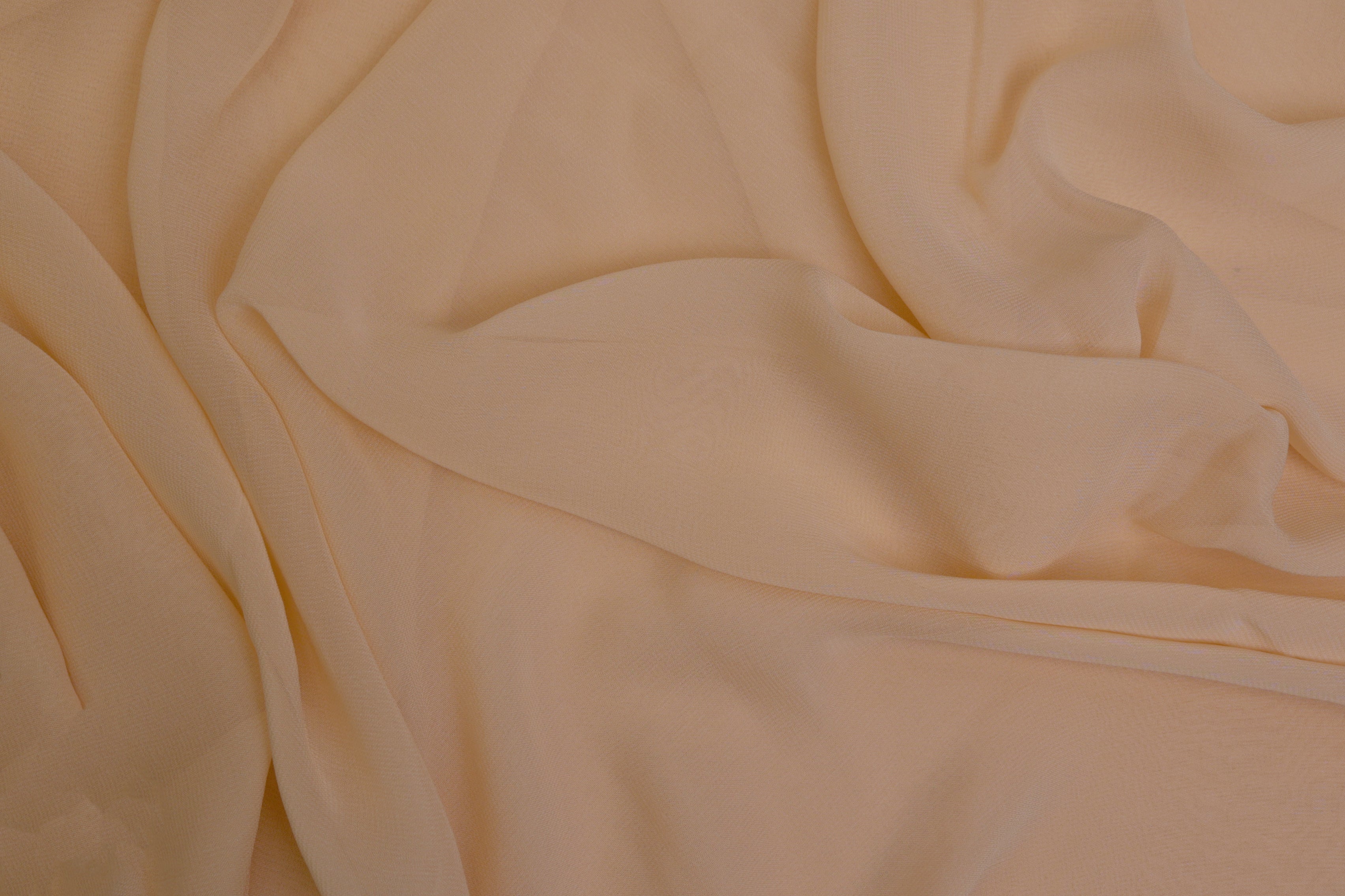 Light peach plain georgette fabric