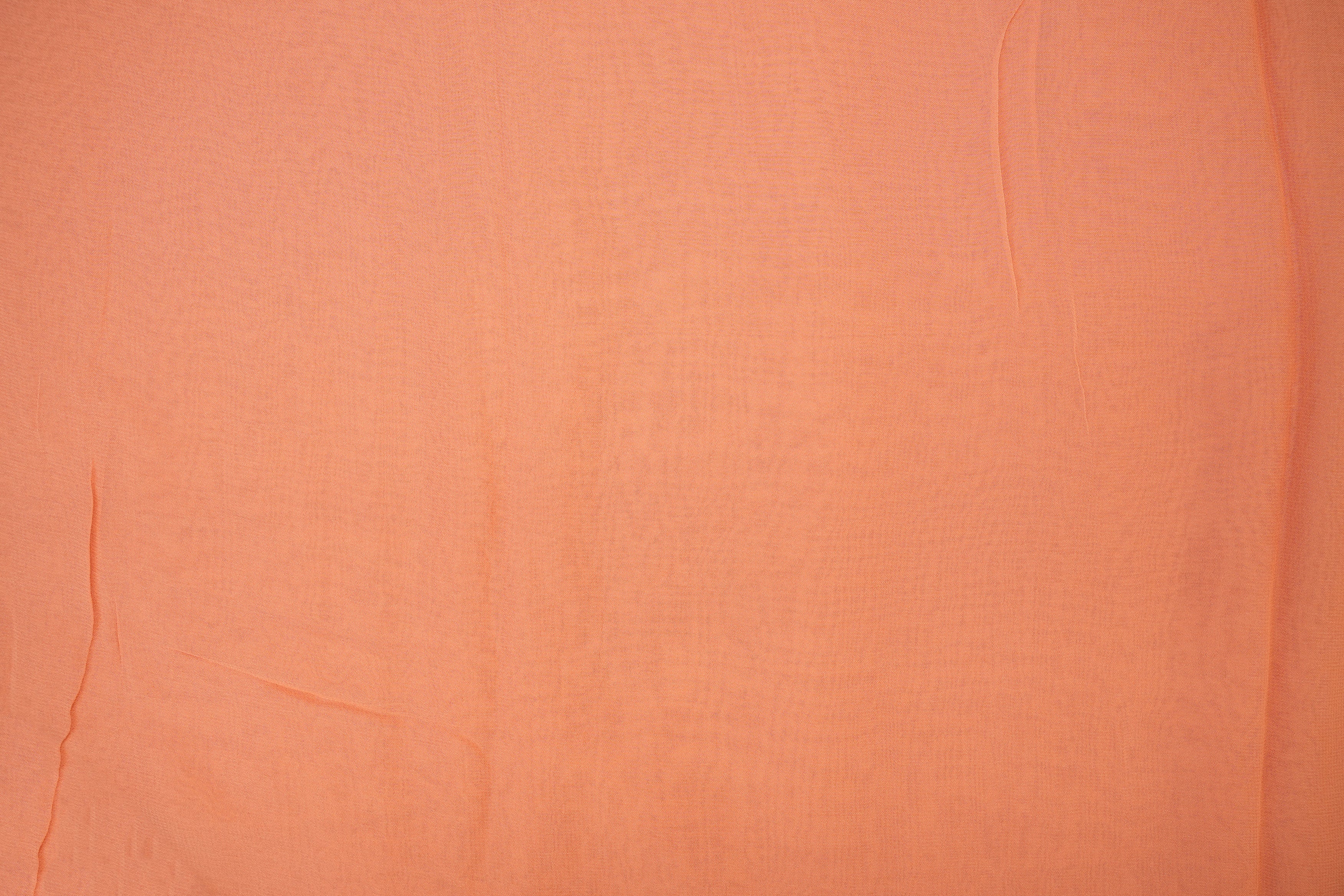 Peach plain georgette fabric