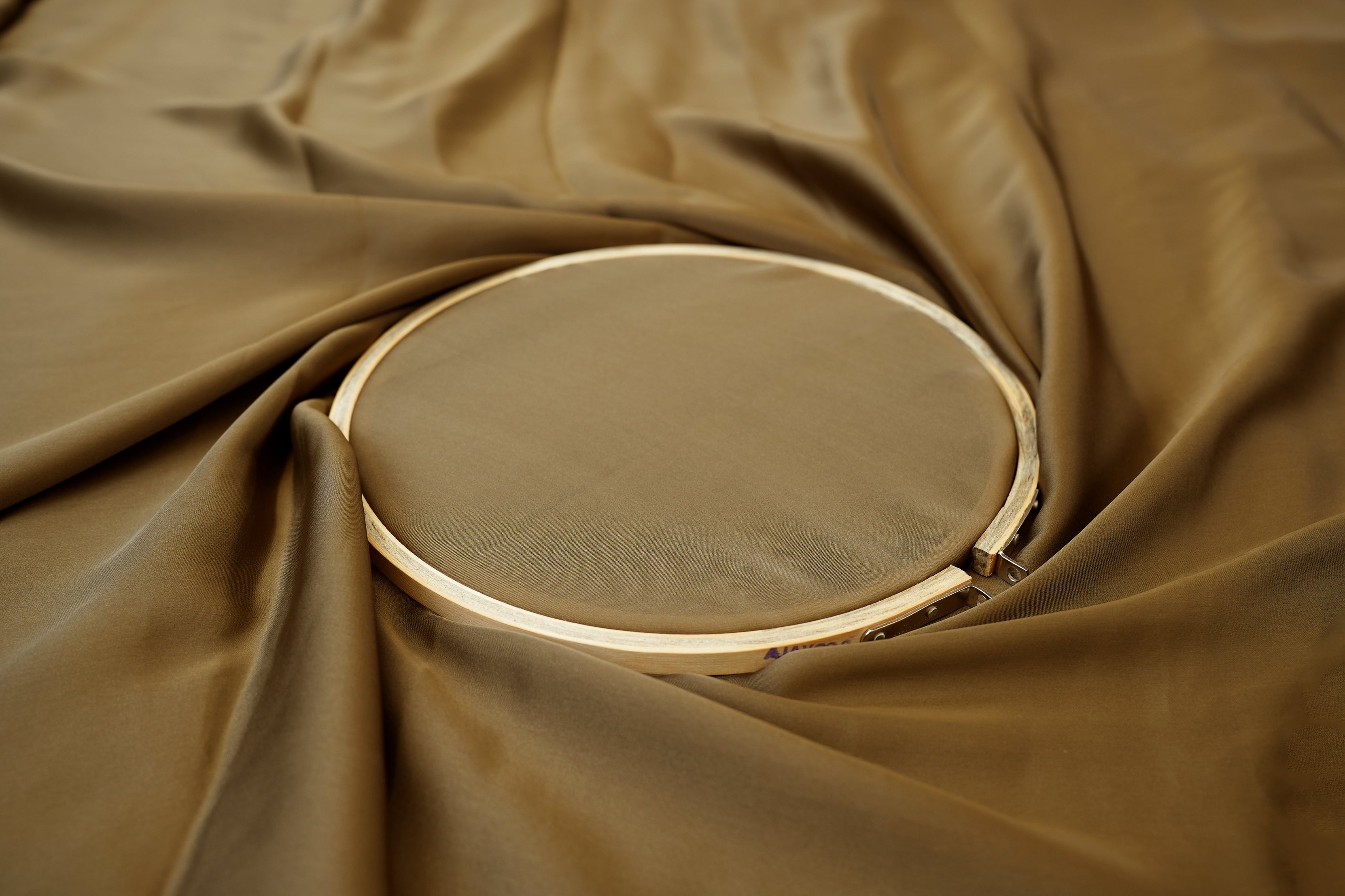 Taupe coloured georgette satin