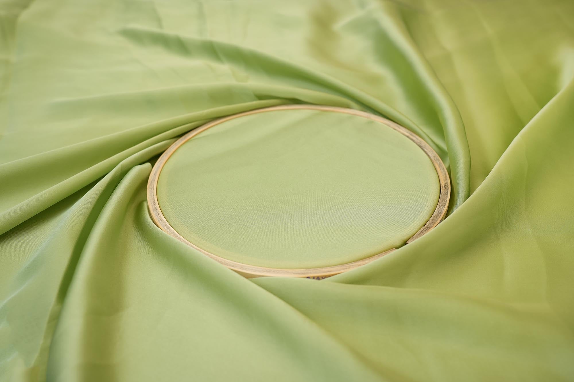 Tea green coloured georgette satin