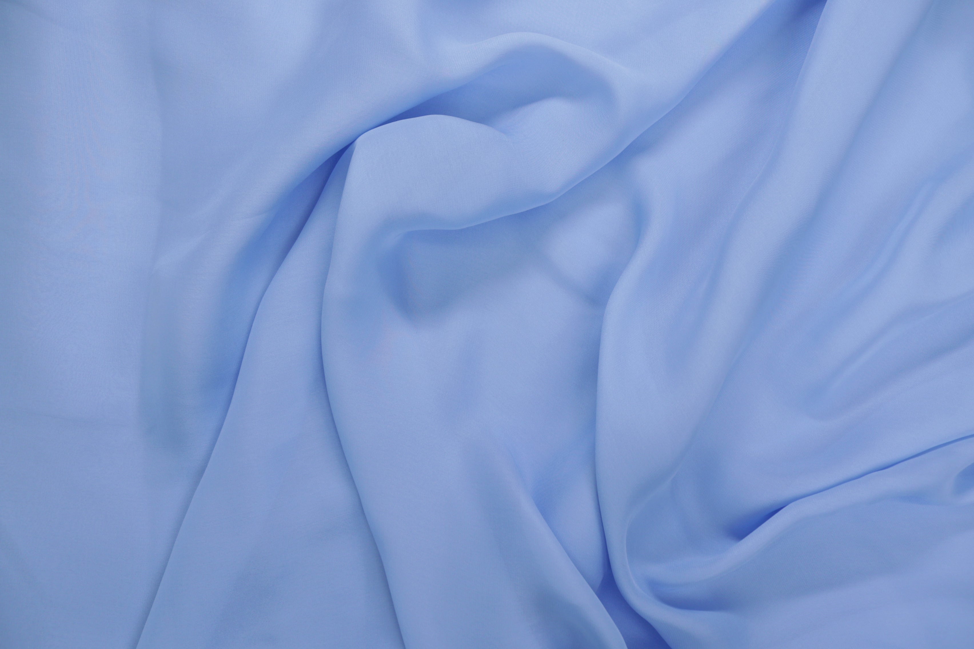 Ice blue coloured georgette satin