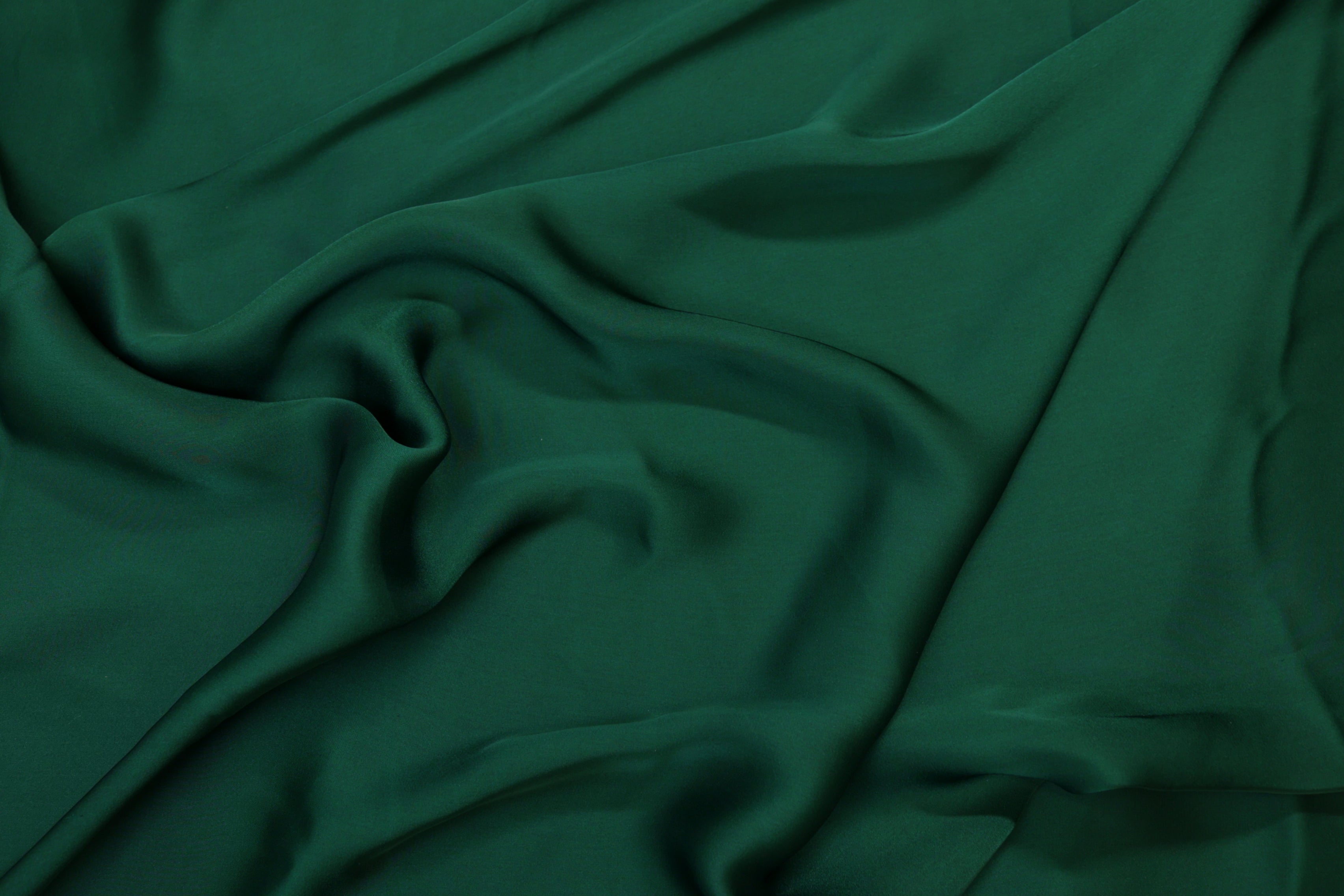 Dark green coloured georgette satin