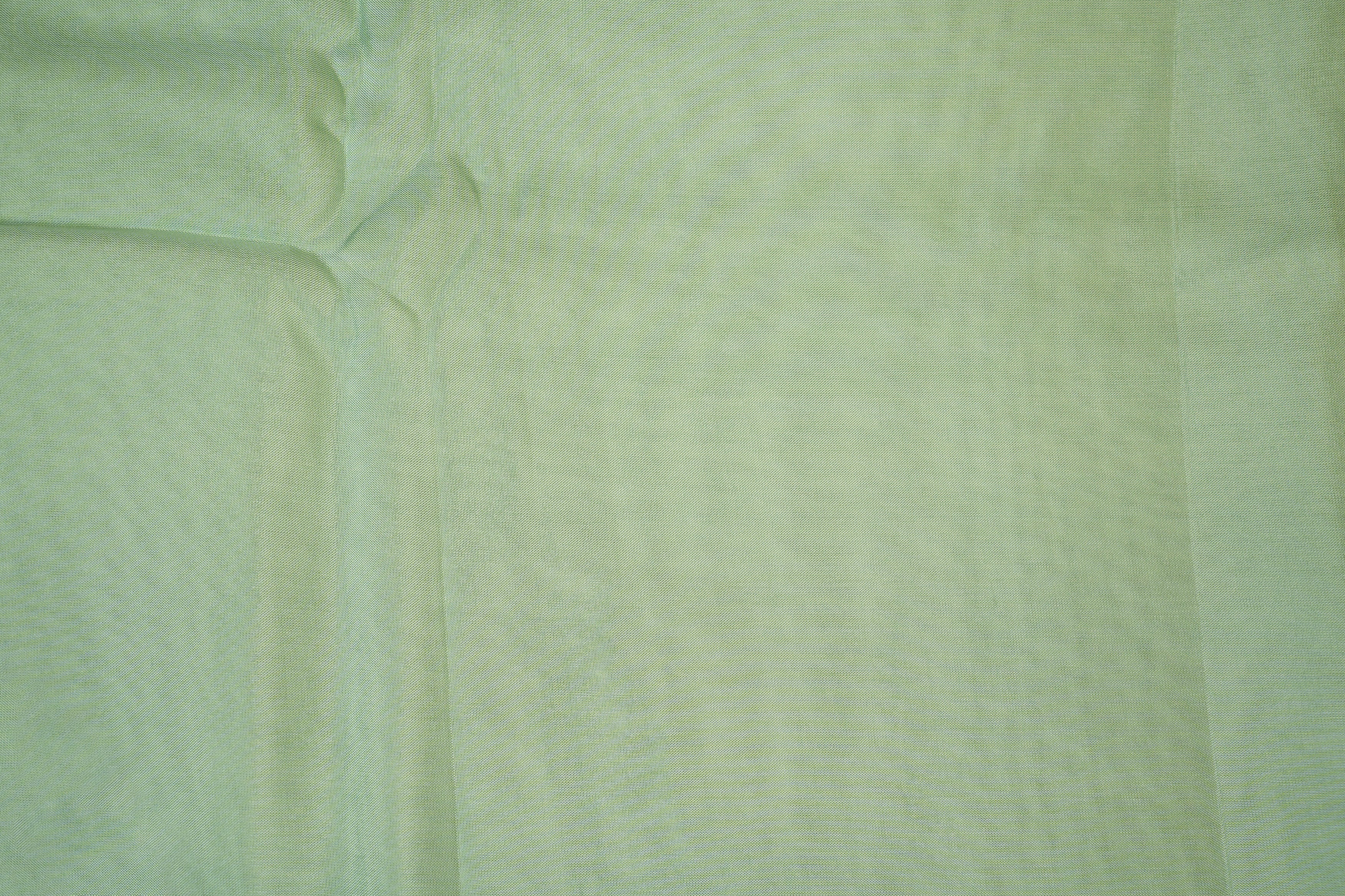 Pista green coloured upada silk fabric