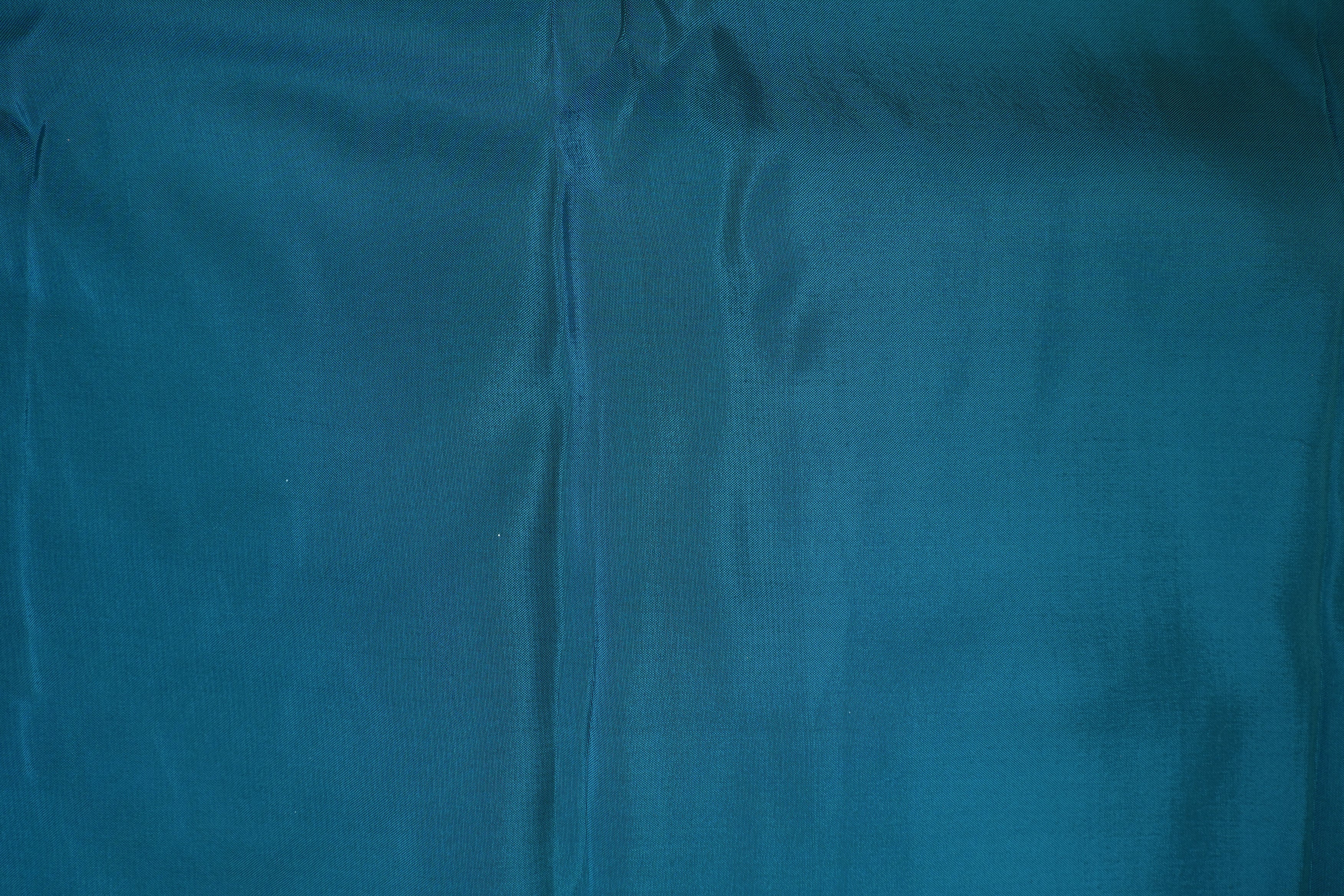 Teal blue coloured upada silk fabric