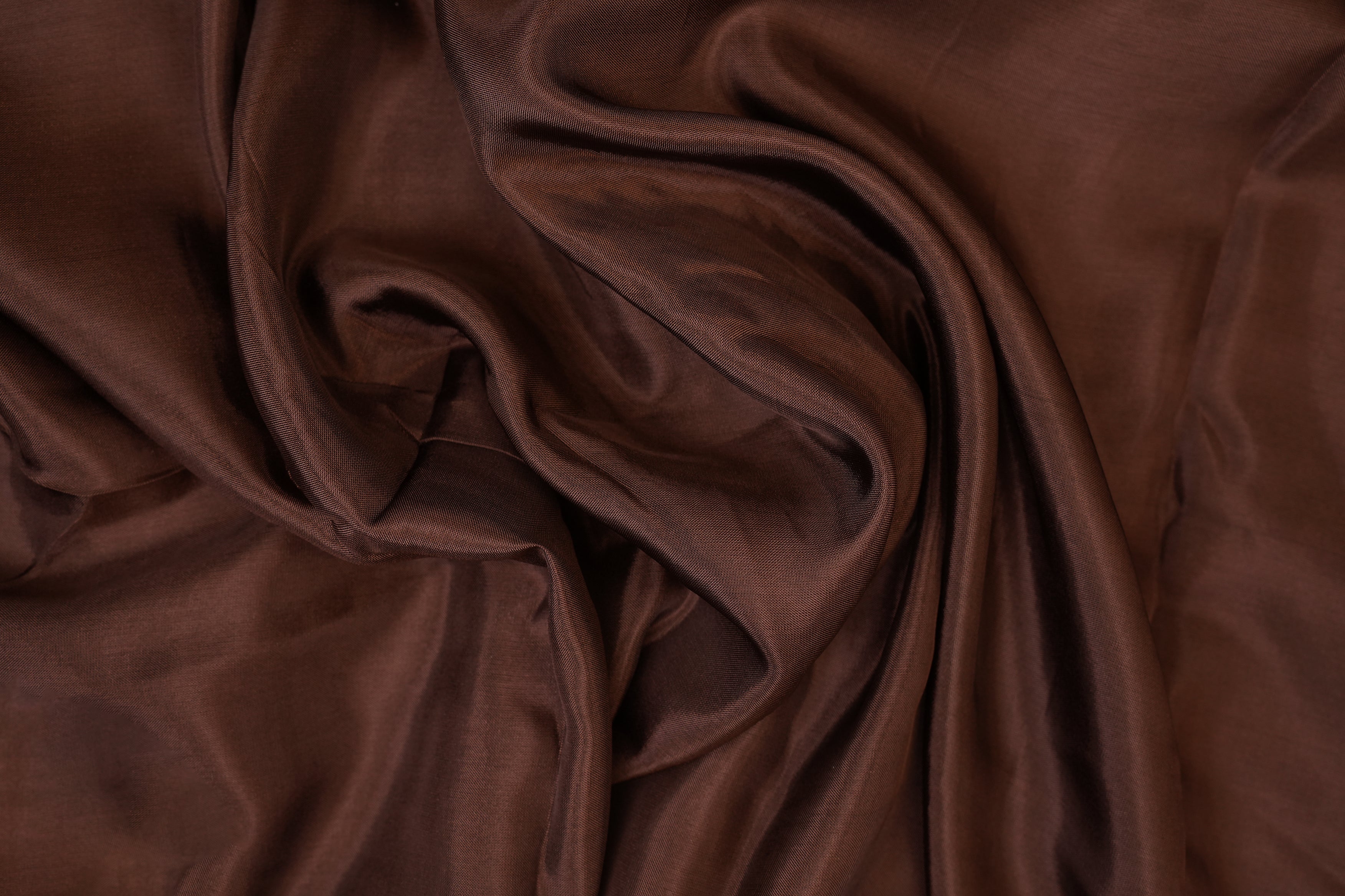 Dark brown coloured upada silk fabric