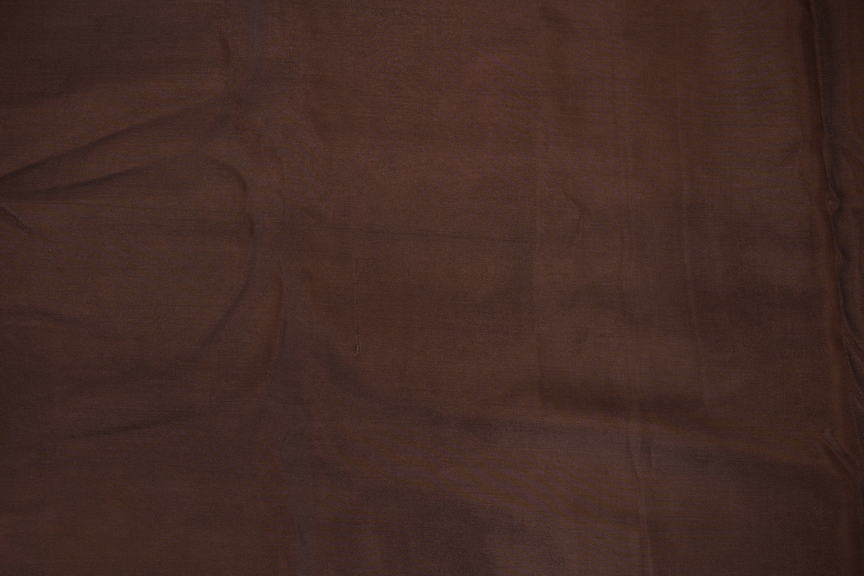 Dark brown coloured upada silk fabric