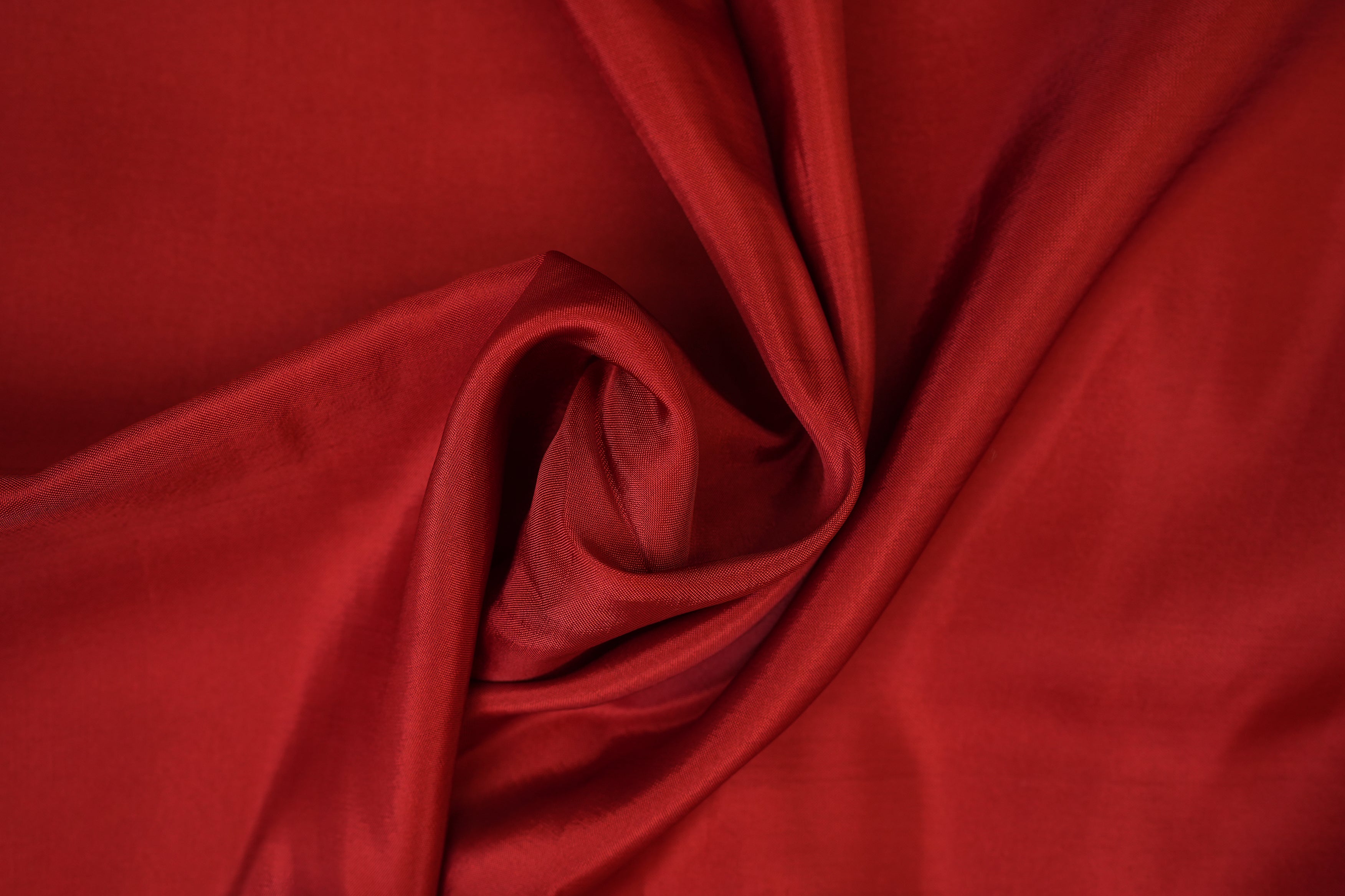 Maroon coloured upada silk fabric