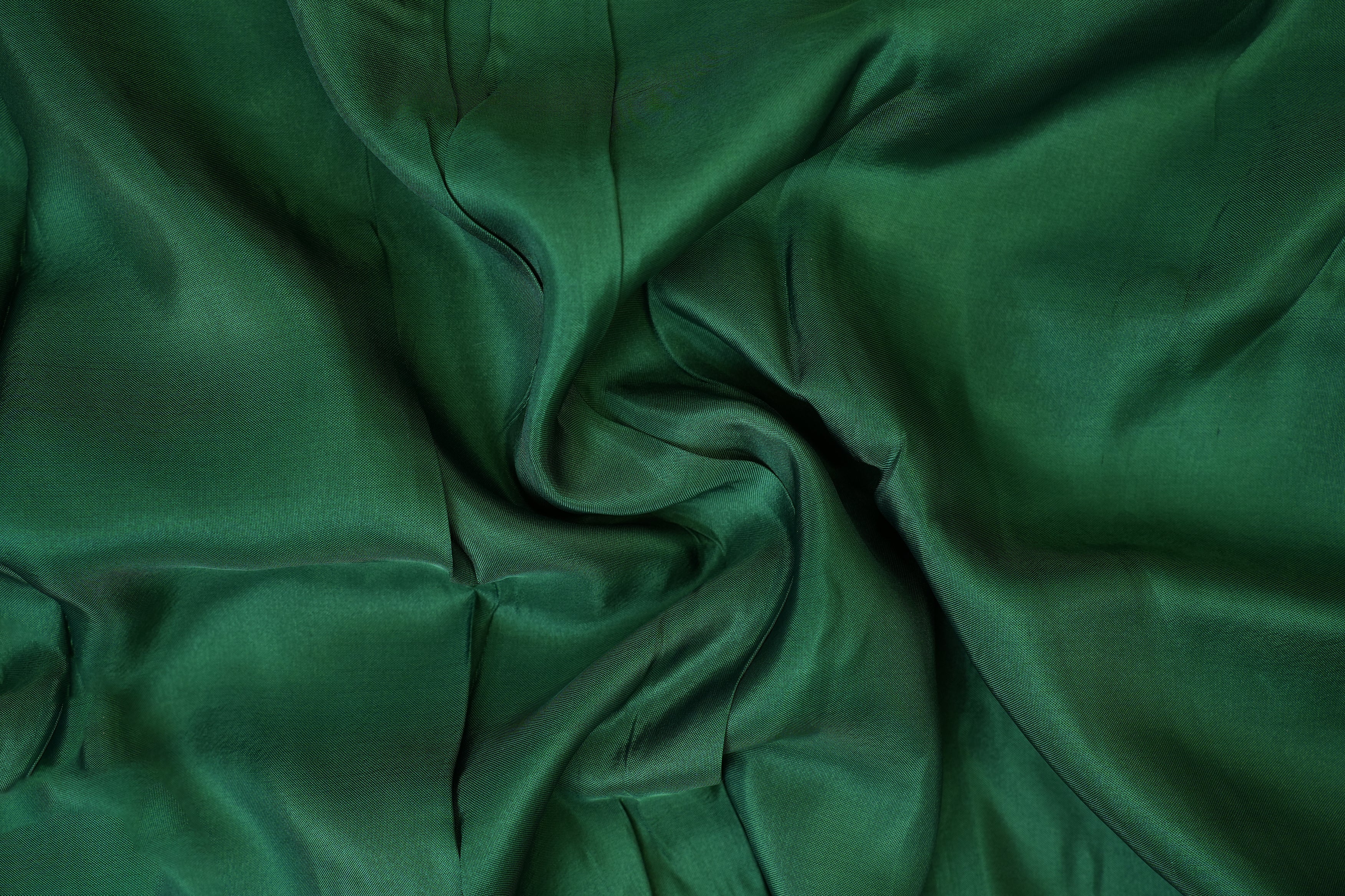 Dark green coloured upada silk fabric