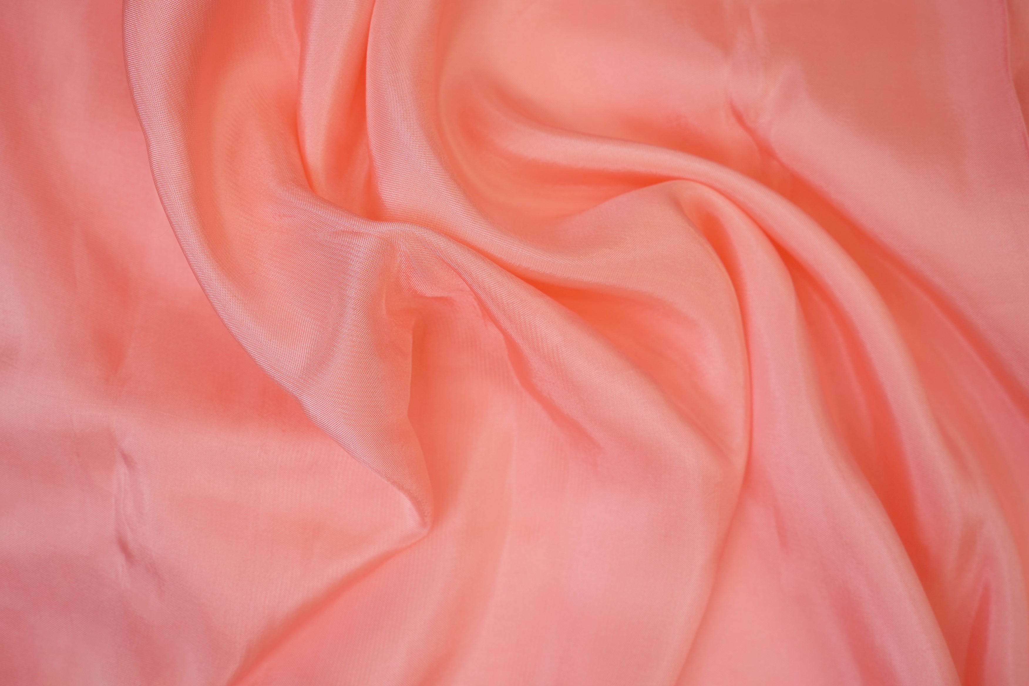 Peach pink coloured upada silk fabric