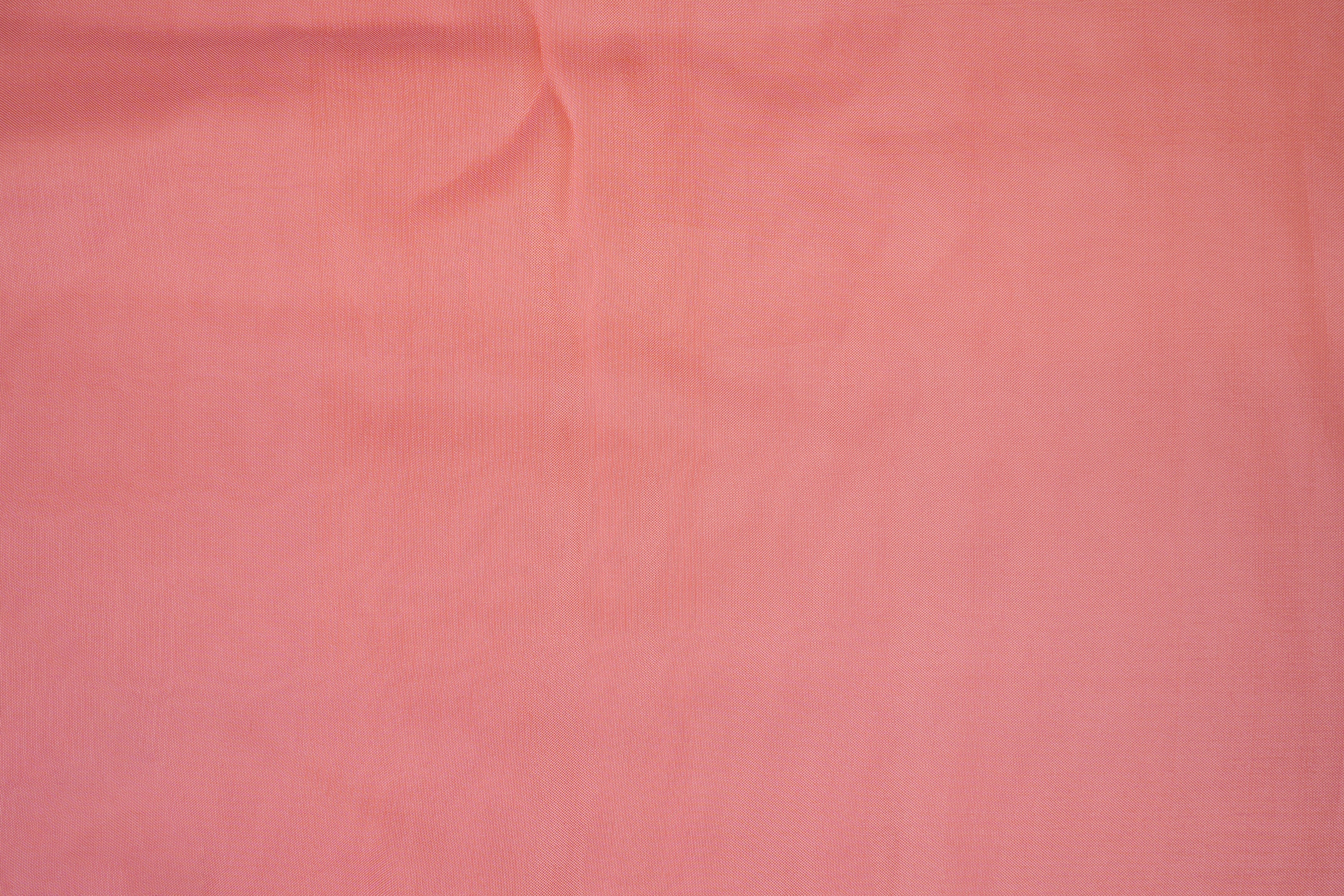 Peach pink coloured upada silk fabric