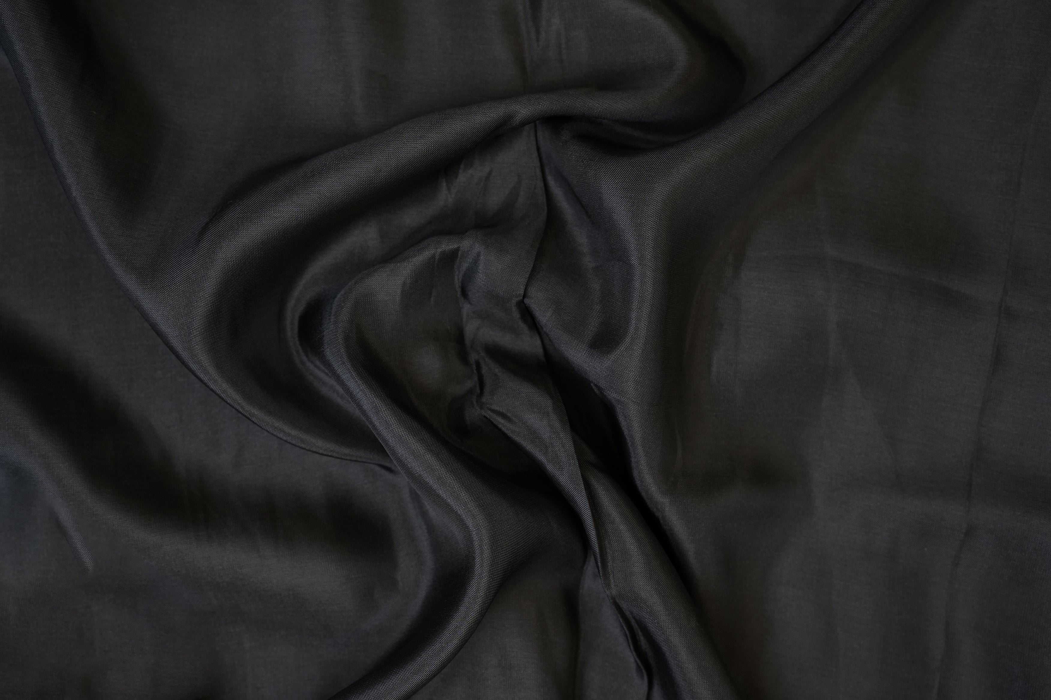 Black coloured upada silk fabric