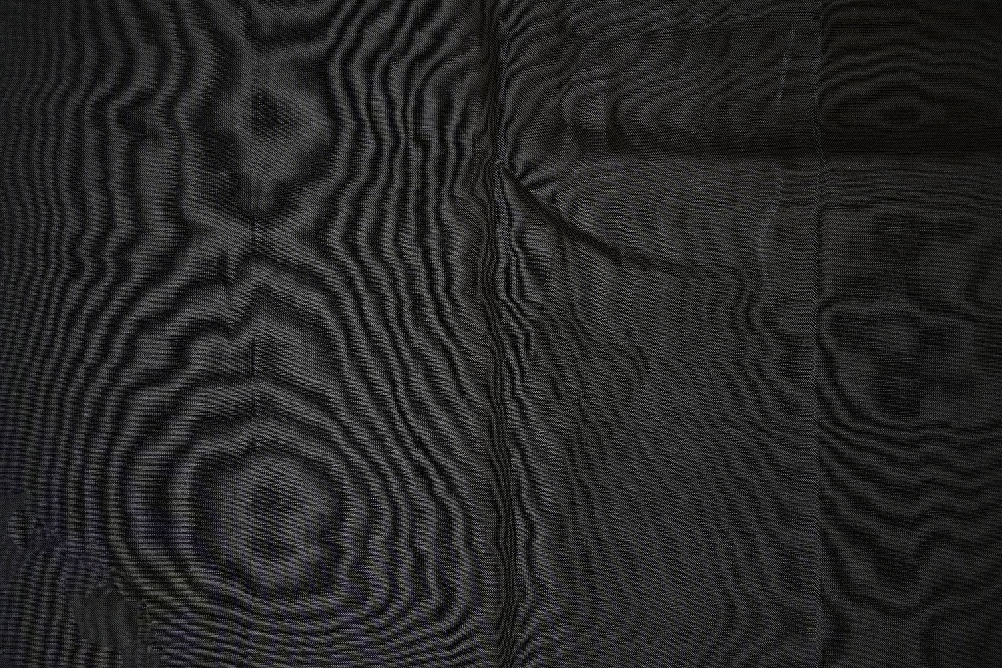 Black coloured upada silk fabric