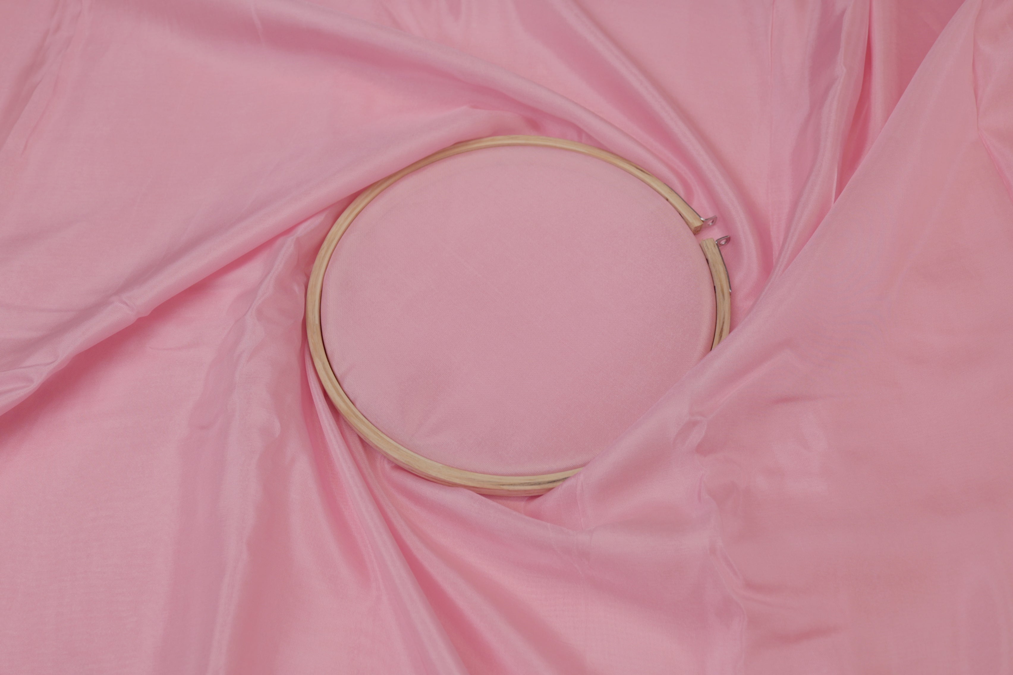 Baby pink coloured crepe fabric