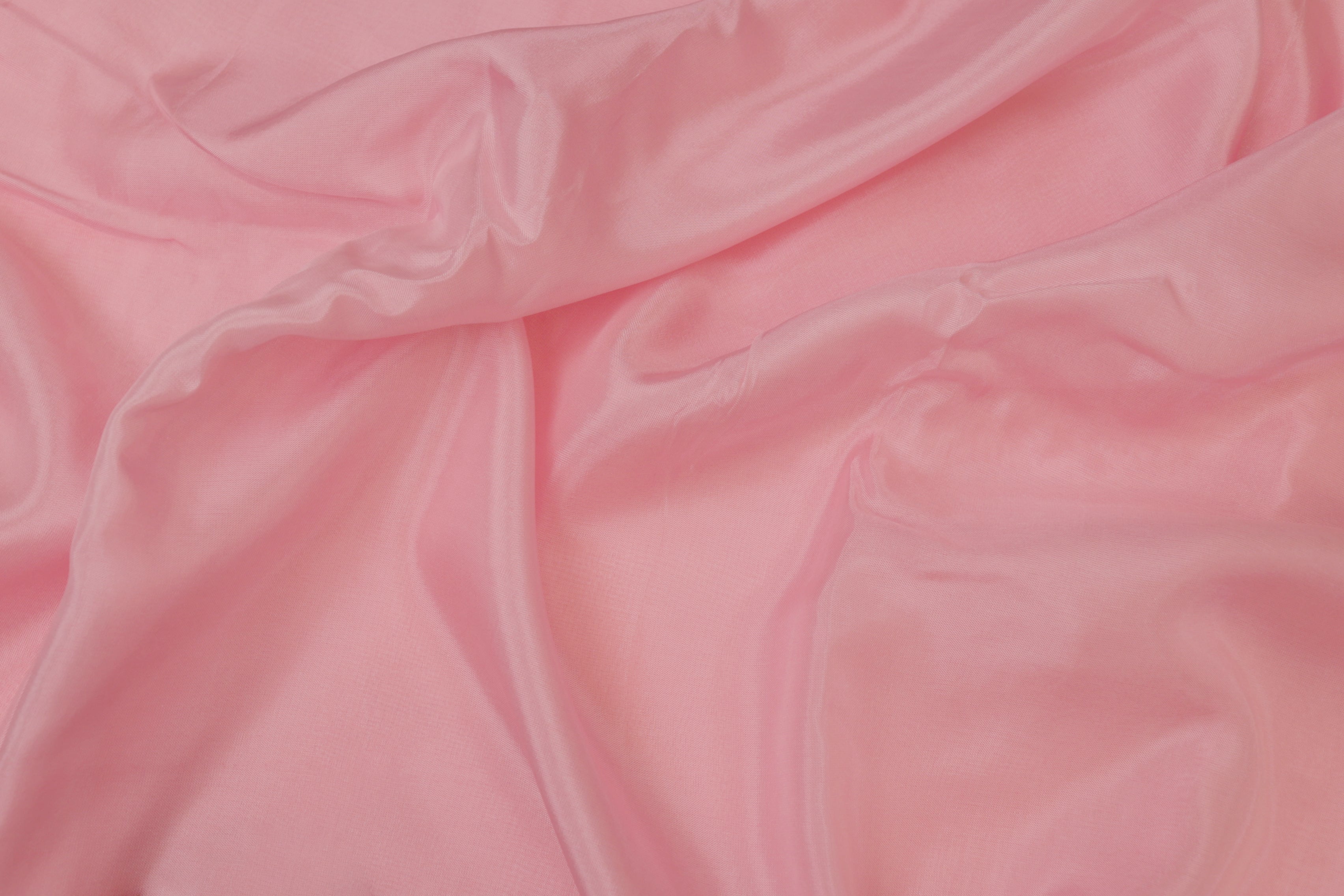 Baby pink coloured crepe fabric