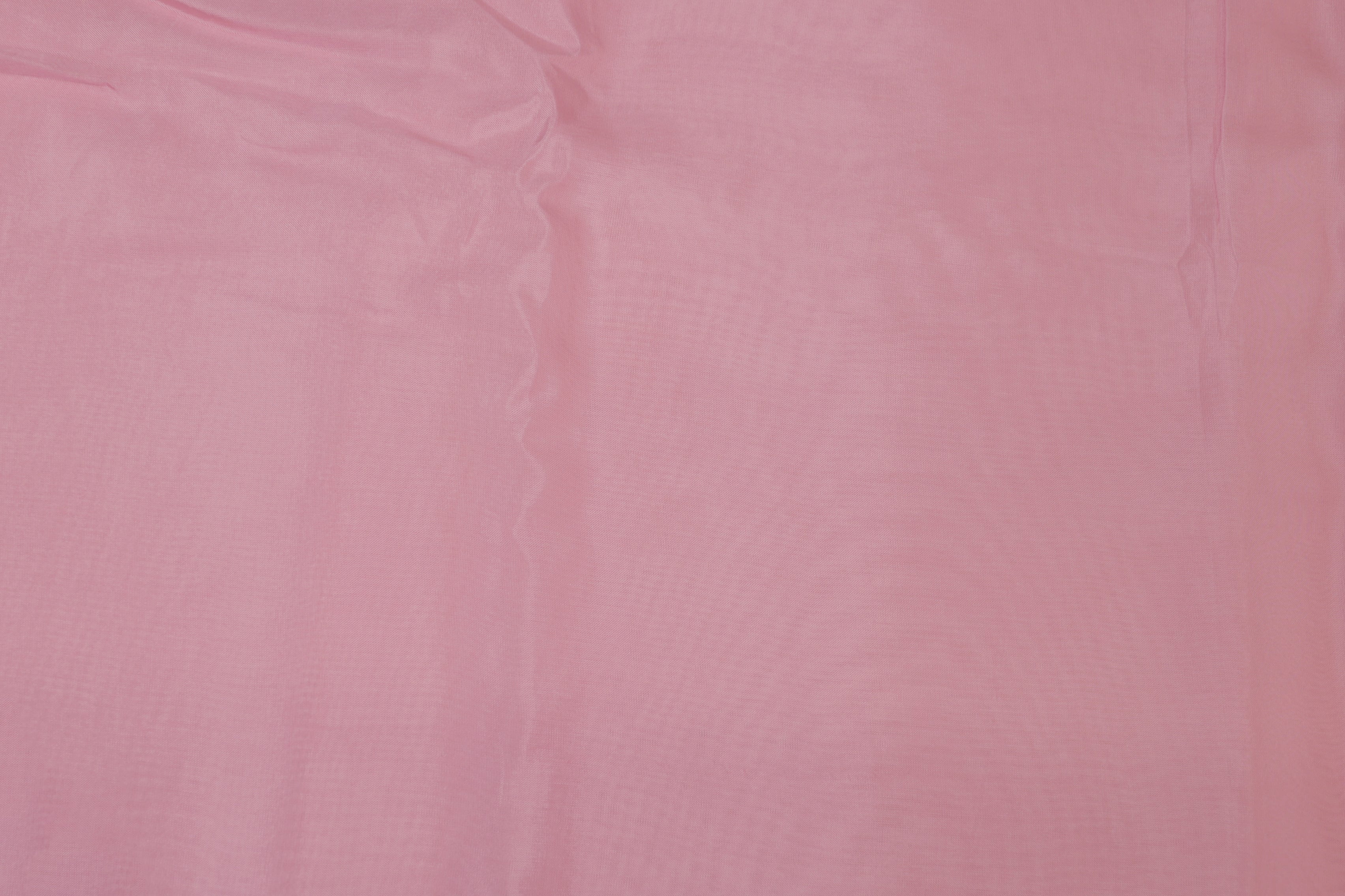 Baby pink coloured crepe fabric