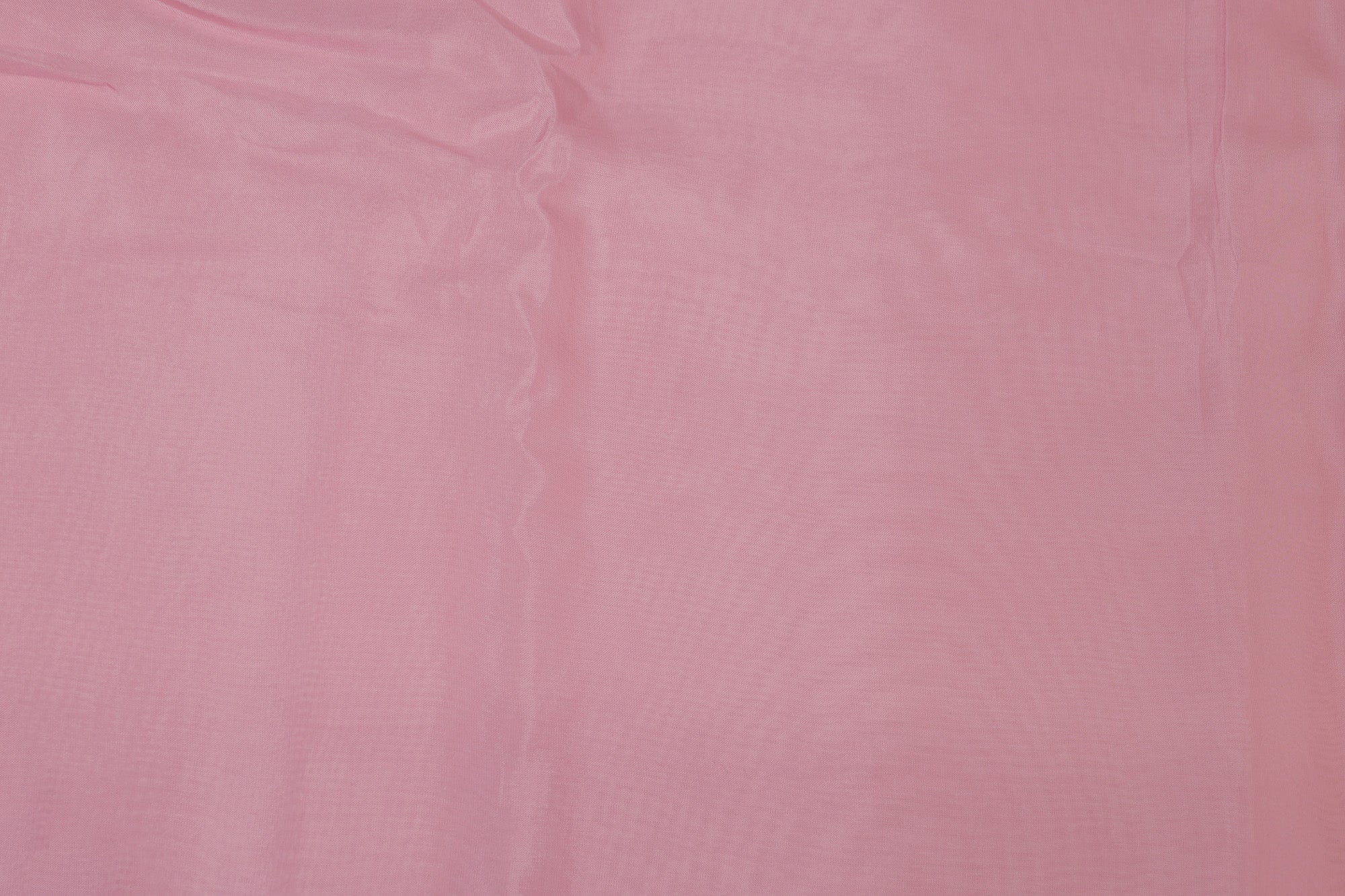 Baby pink coloured crepe fabric