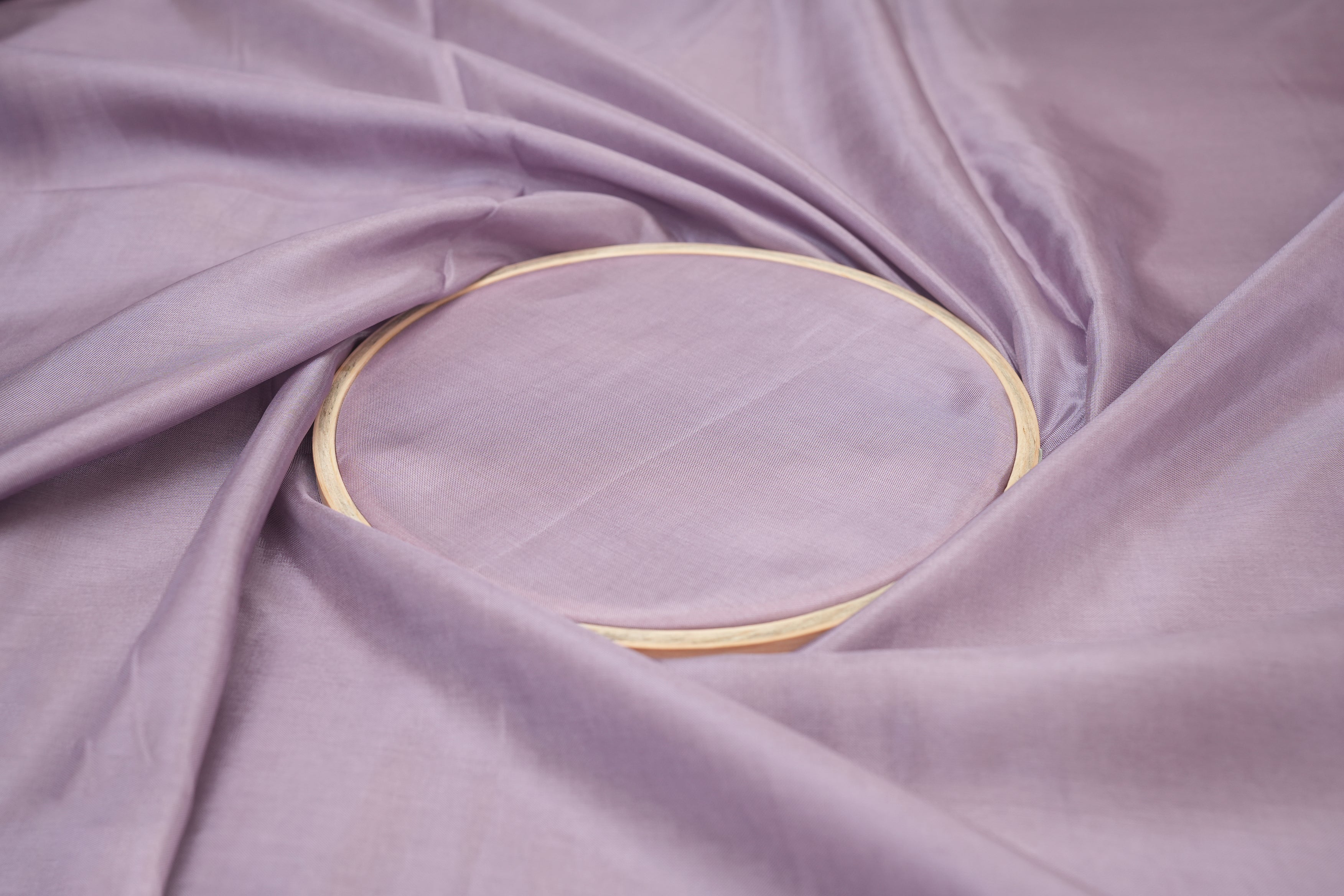 Mauve coloured upada silk fabric