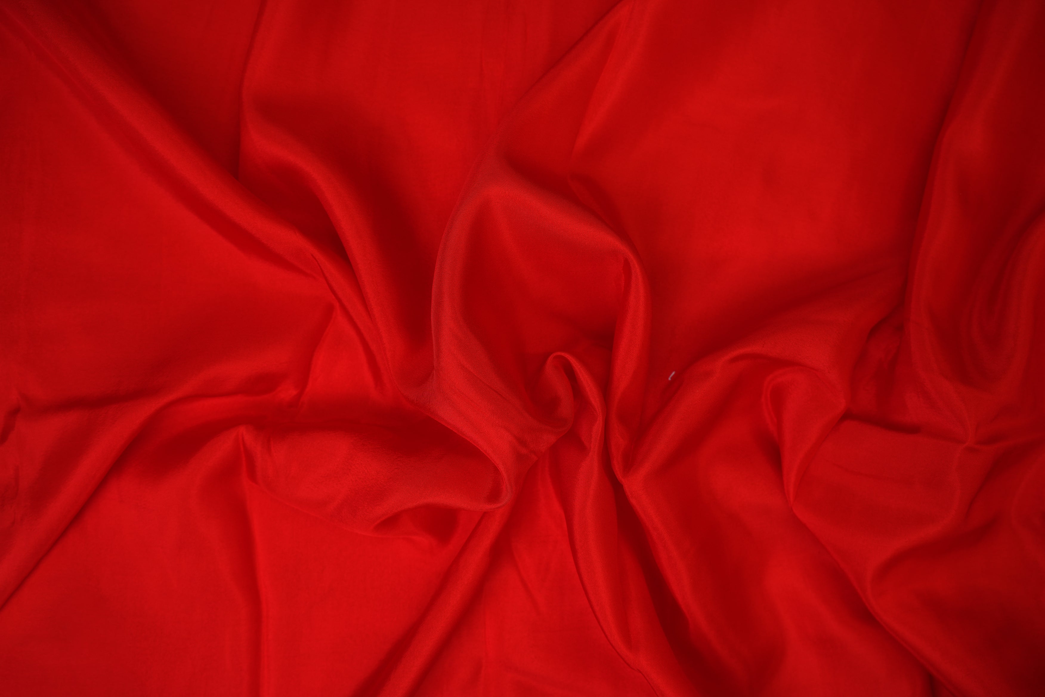 Red coloured upada silk fabric