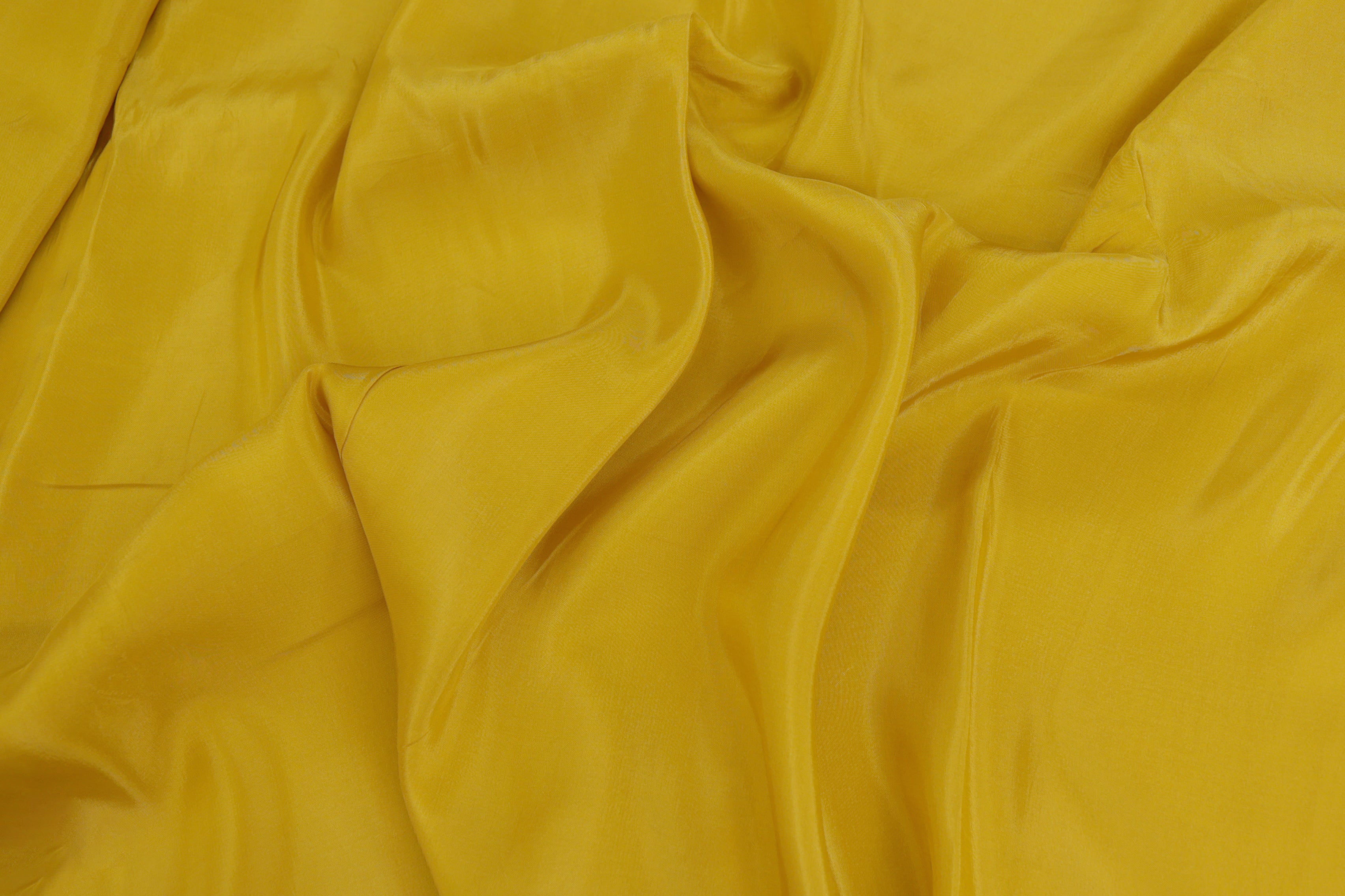 Citrus Yellow coloured upada silk fabric