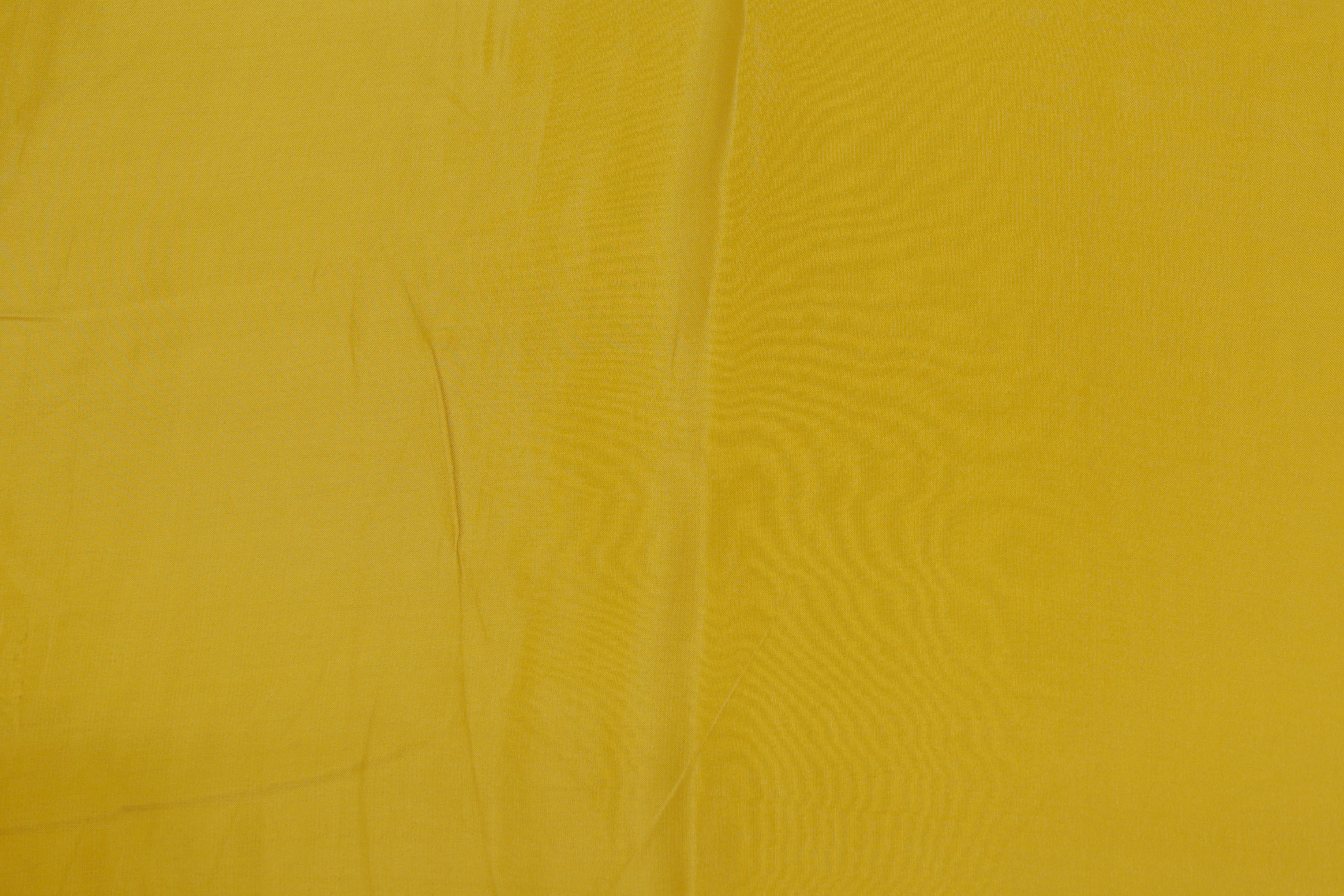 Citrus Yellow coloured upada silk fabric