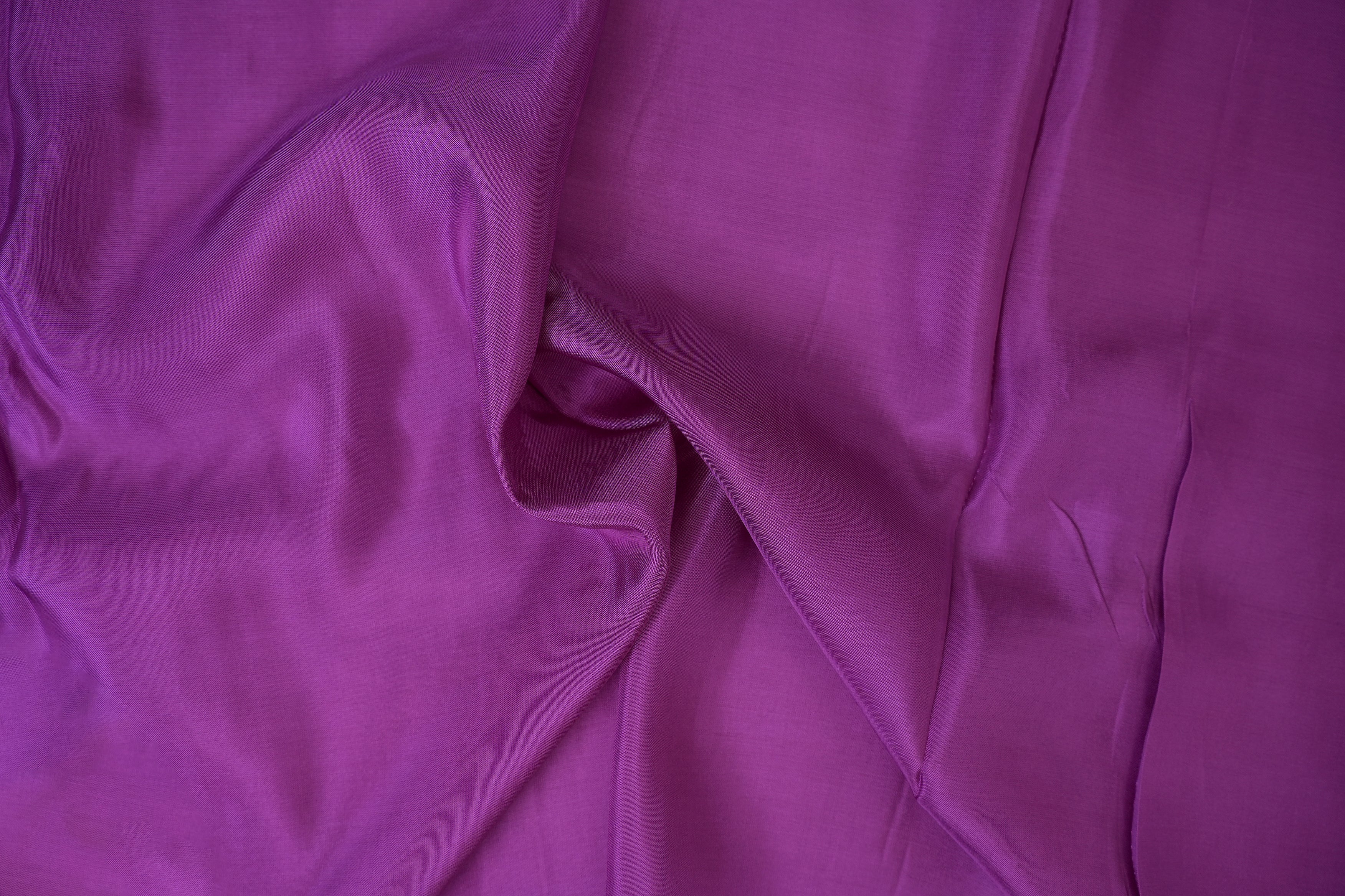 Dark purple coloured upada silk fabric