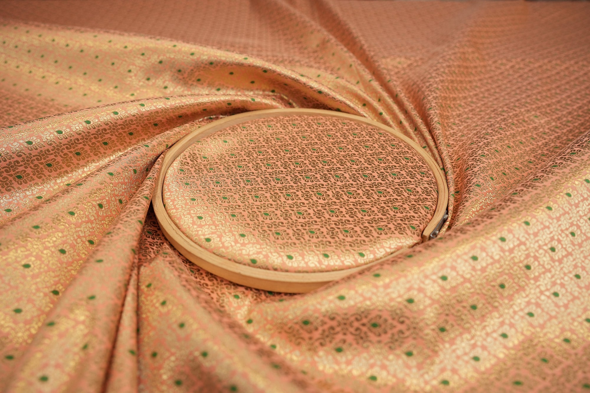 Peach colour banarasi brocade fabric with beautiful traditional pattern