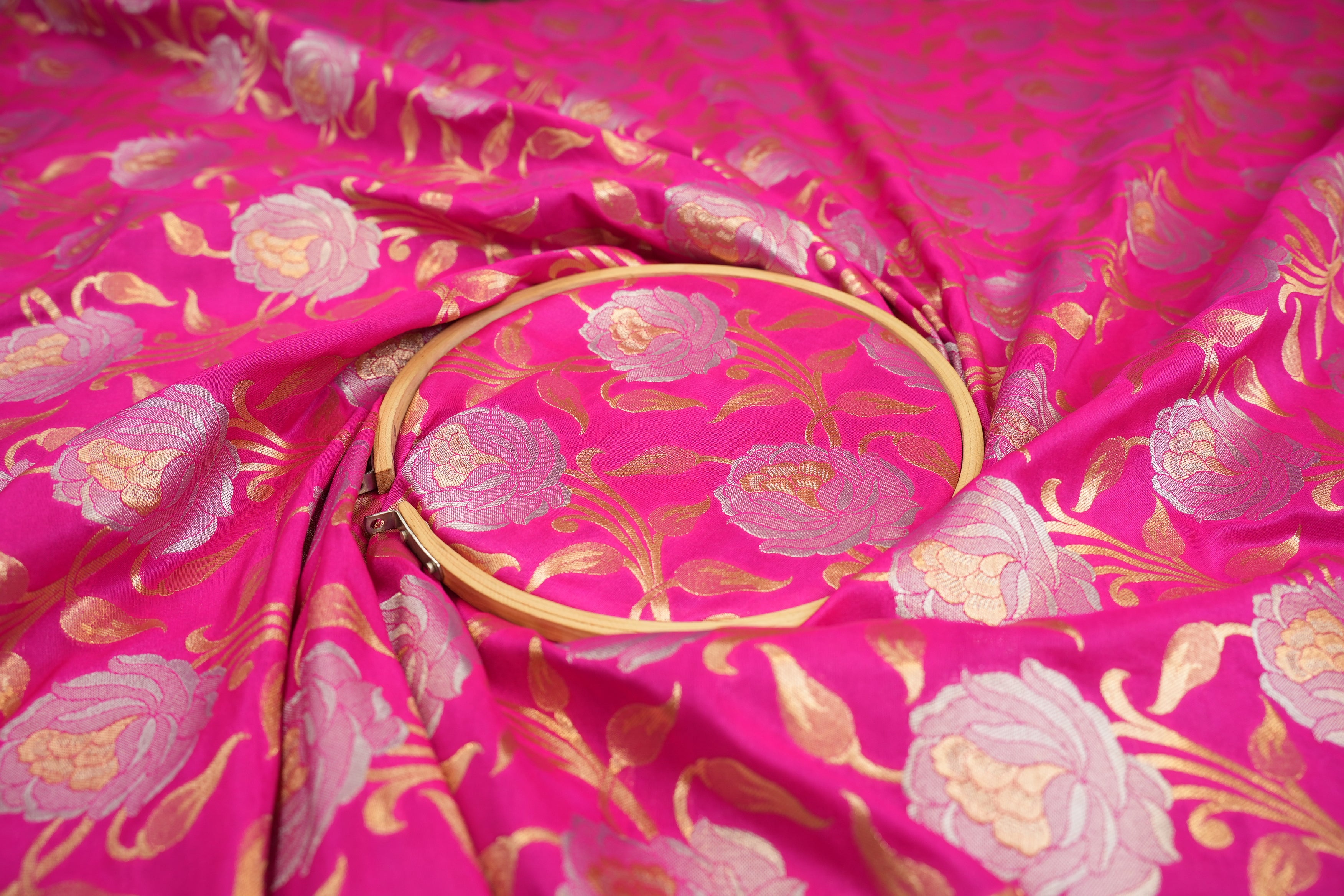 Rani pink colour banarasi brocade fabric with beautiful floral pattern