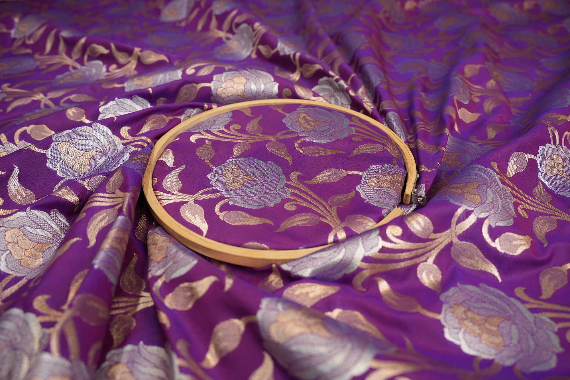 Purple colour banarasi brocade fabric with beautiful floral pattern