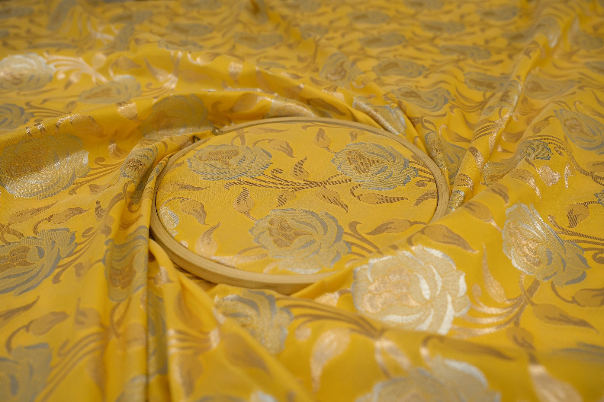 Yellow colour banarasi brocade fabric with beautiful floral pattern