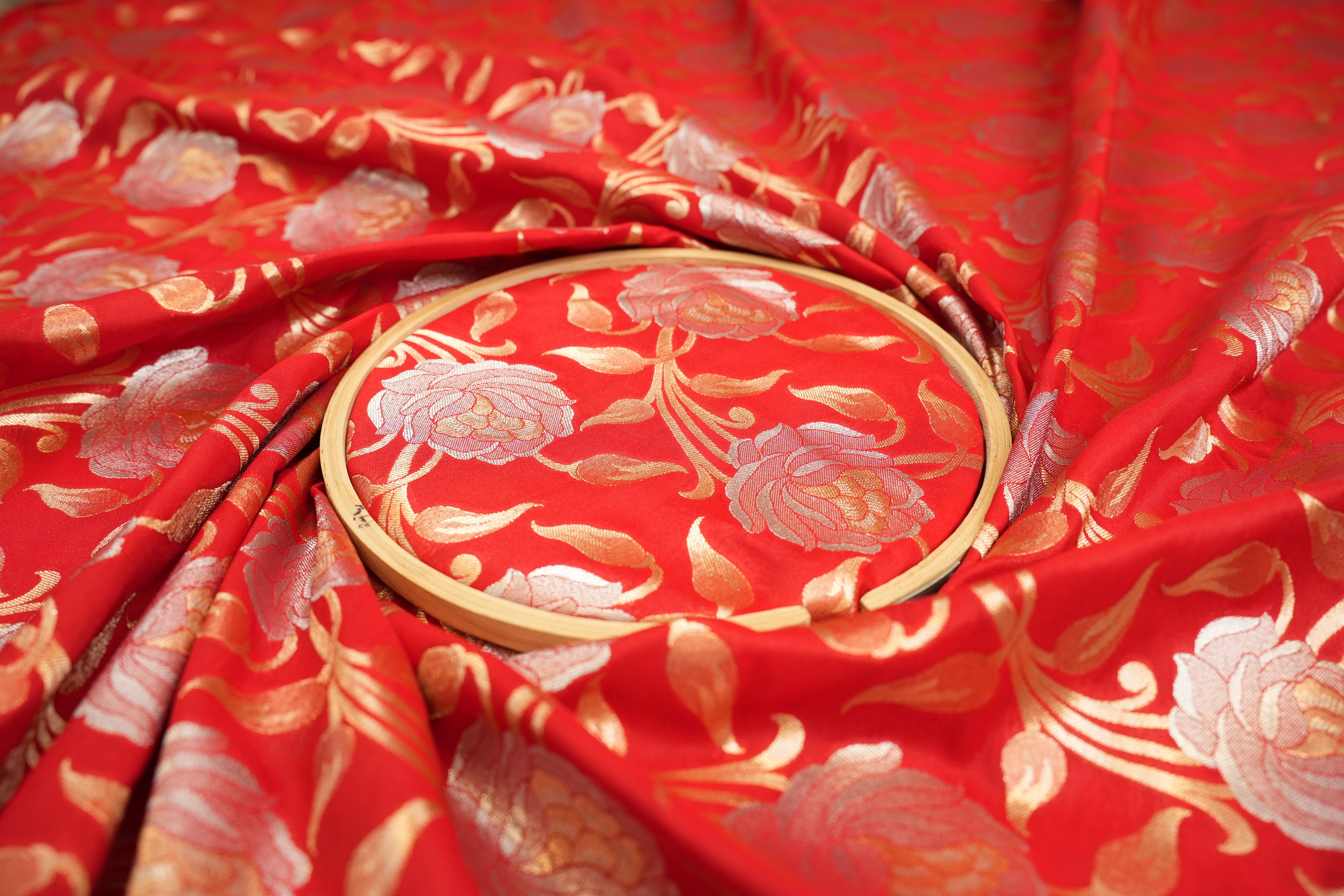 Red colour banarasi brocade fabric with beautiful floral pattern