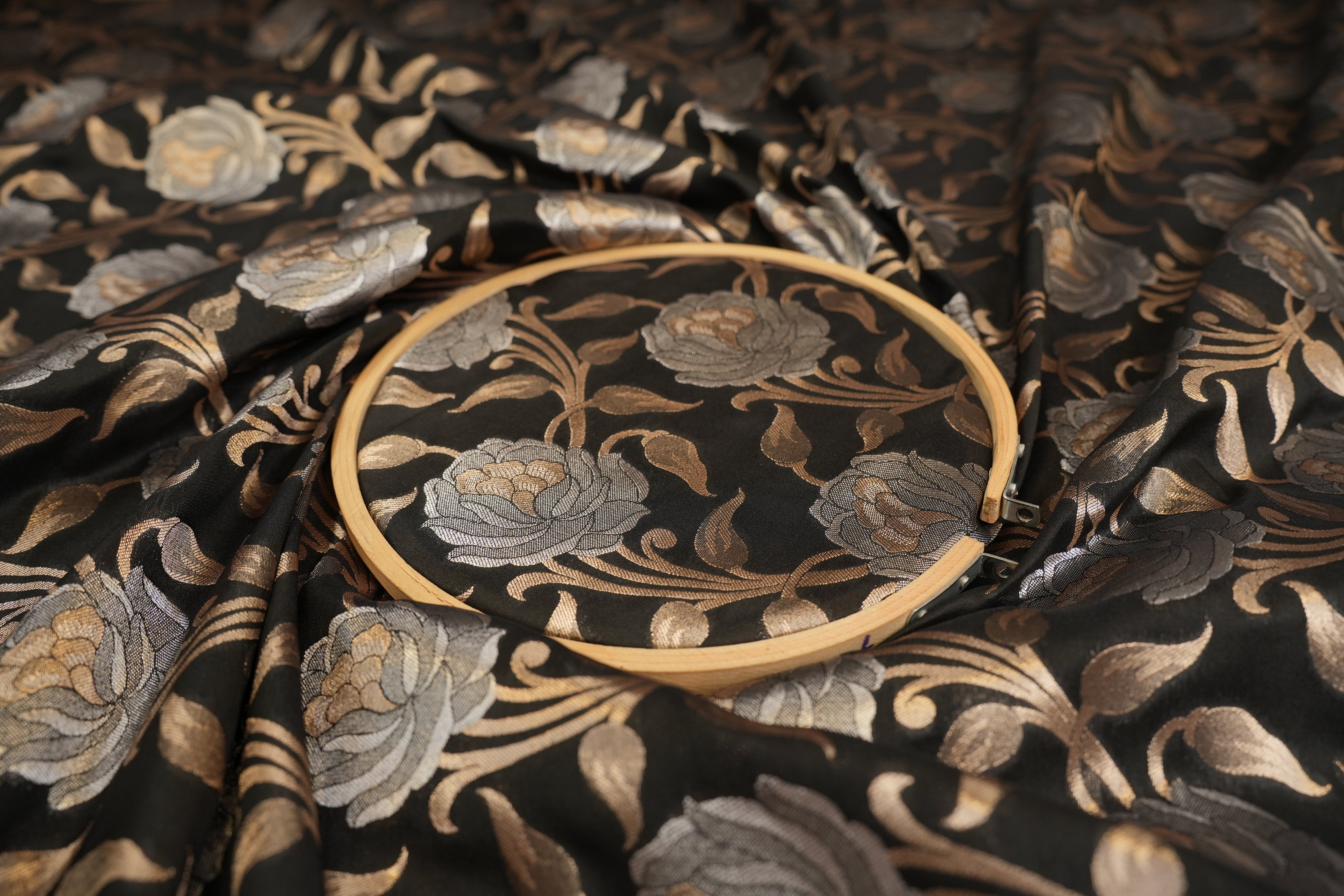 Black colour banarasi brocade fabric with beautiful floral pattern