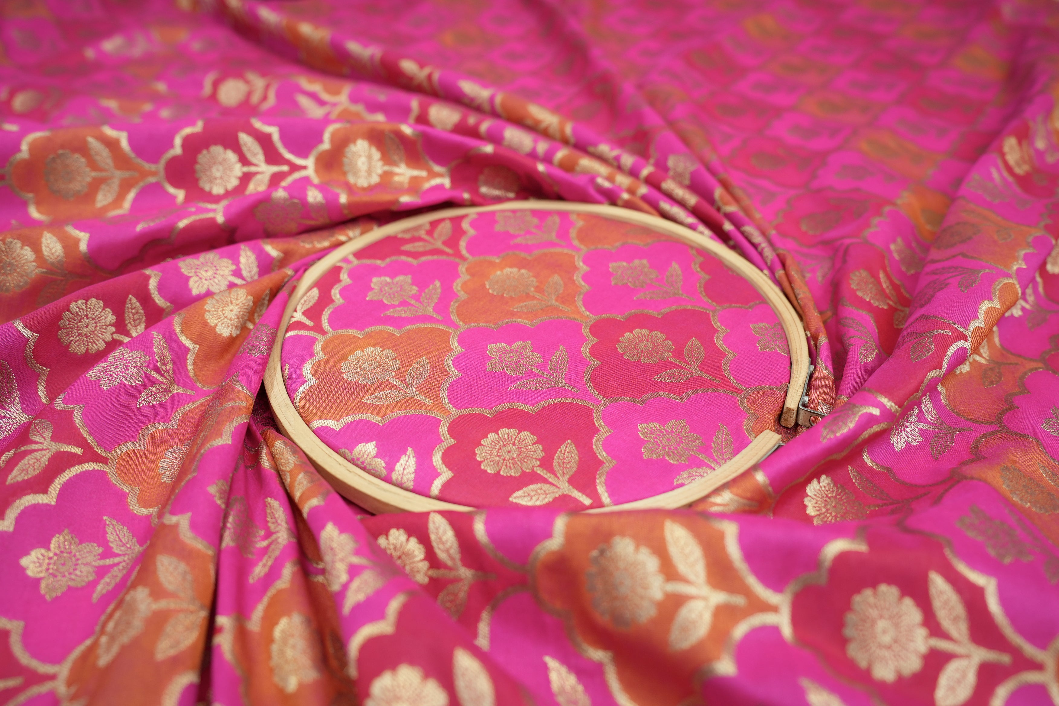 Pink colour banarasi brocade fabric with beautiful floral pattern