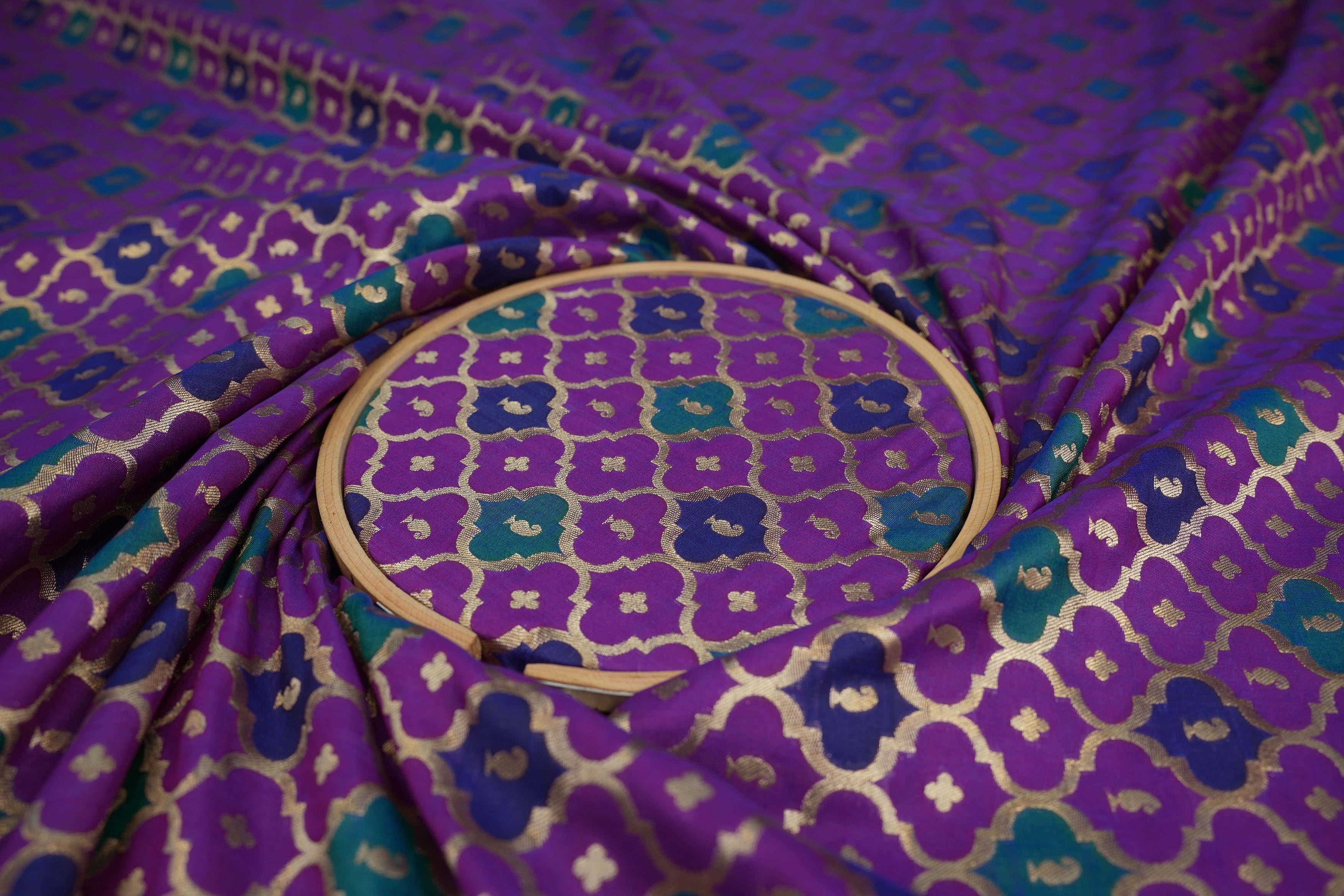 Purple banarasi brocade fabric with beautiful traditional pattern